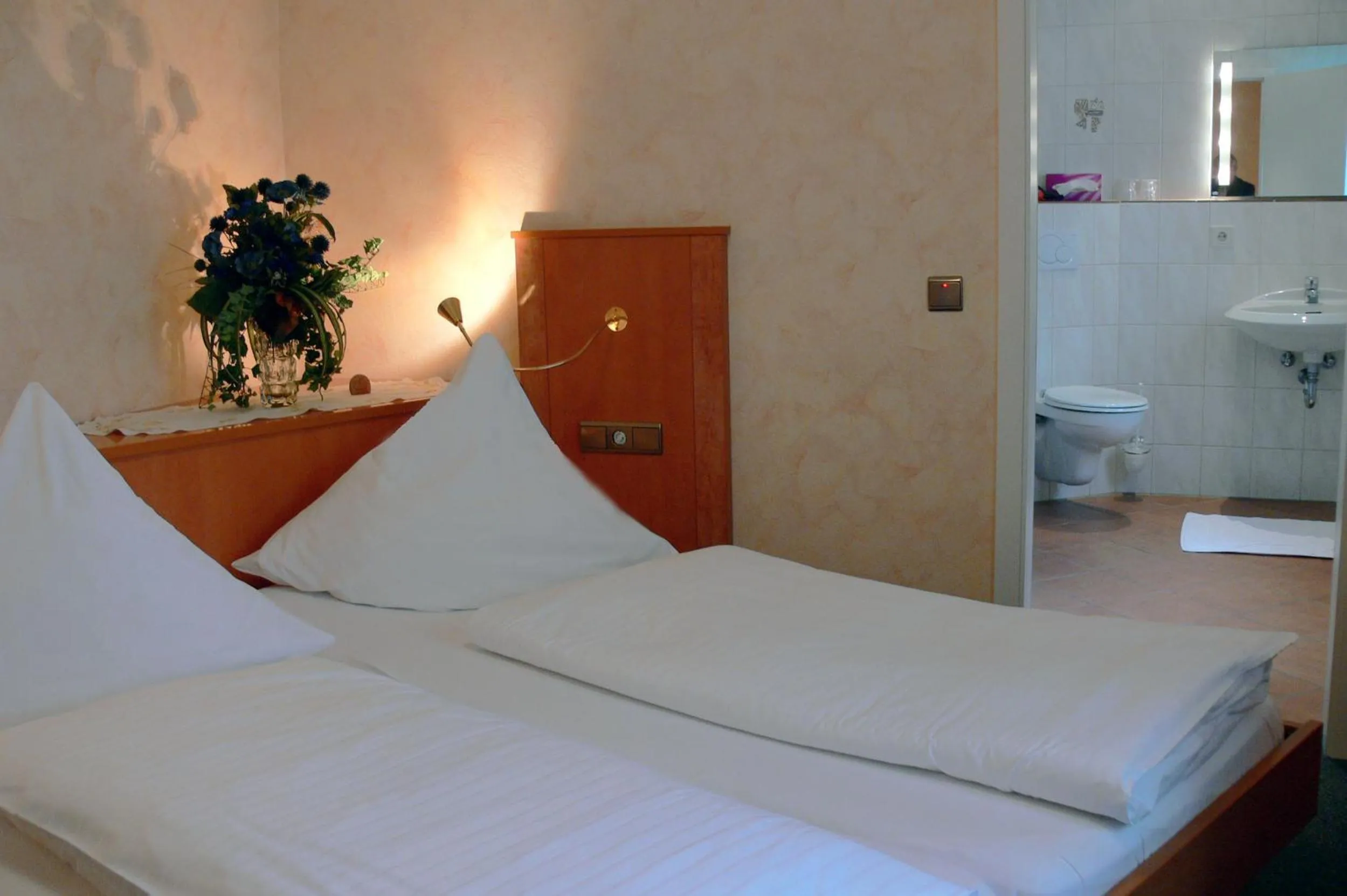 Bed in Hotel Quellenhof