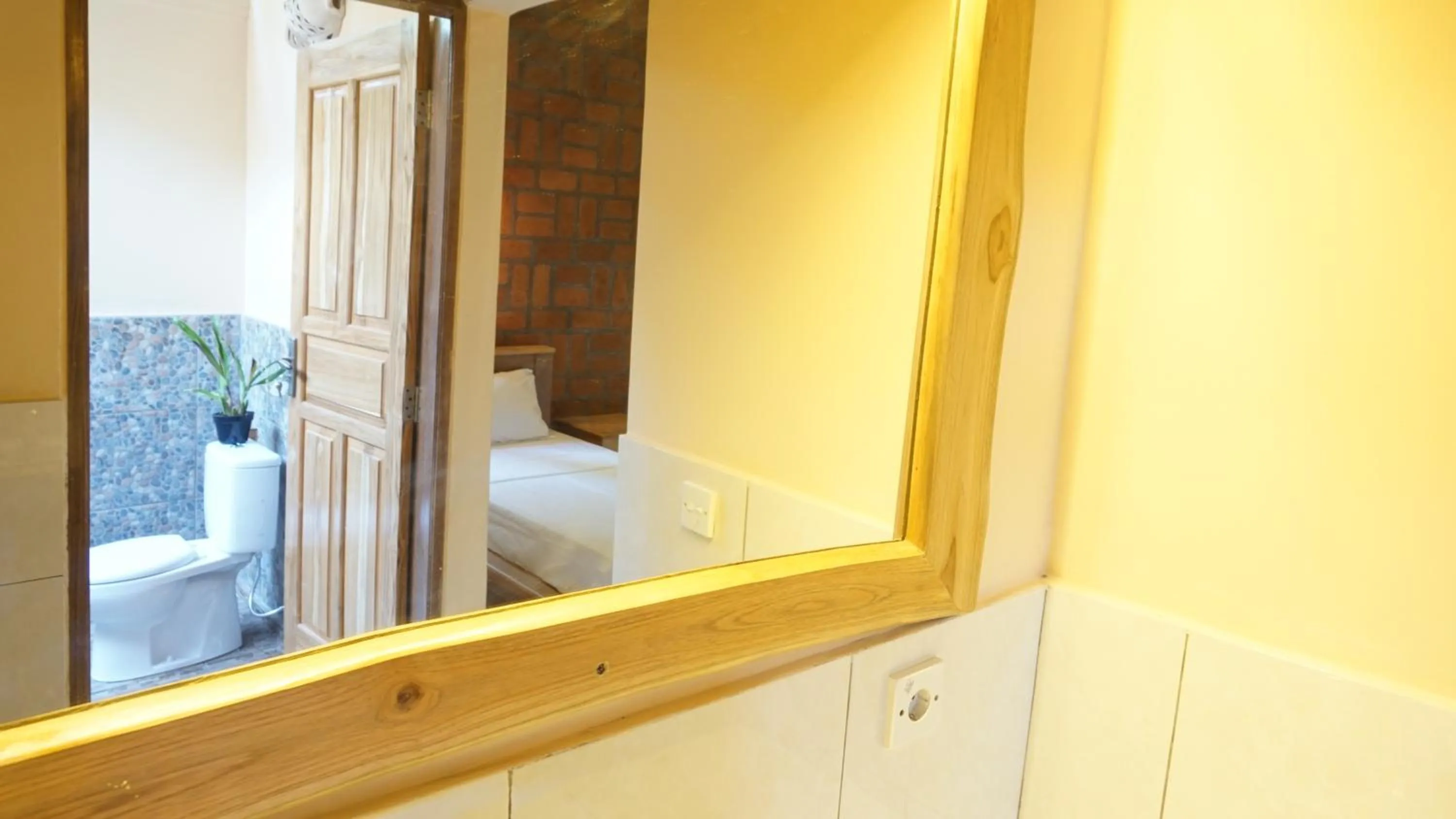 Bathroom, Bed in Biorock Homestay & Dive Center Pemuteran