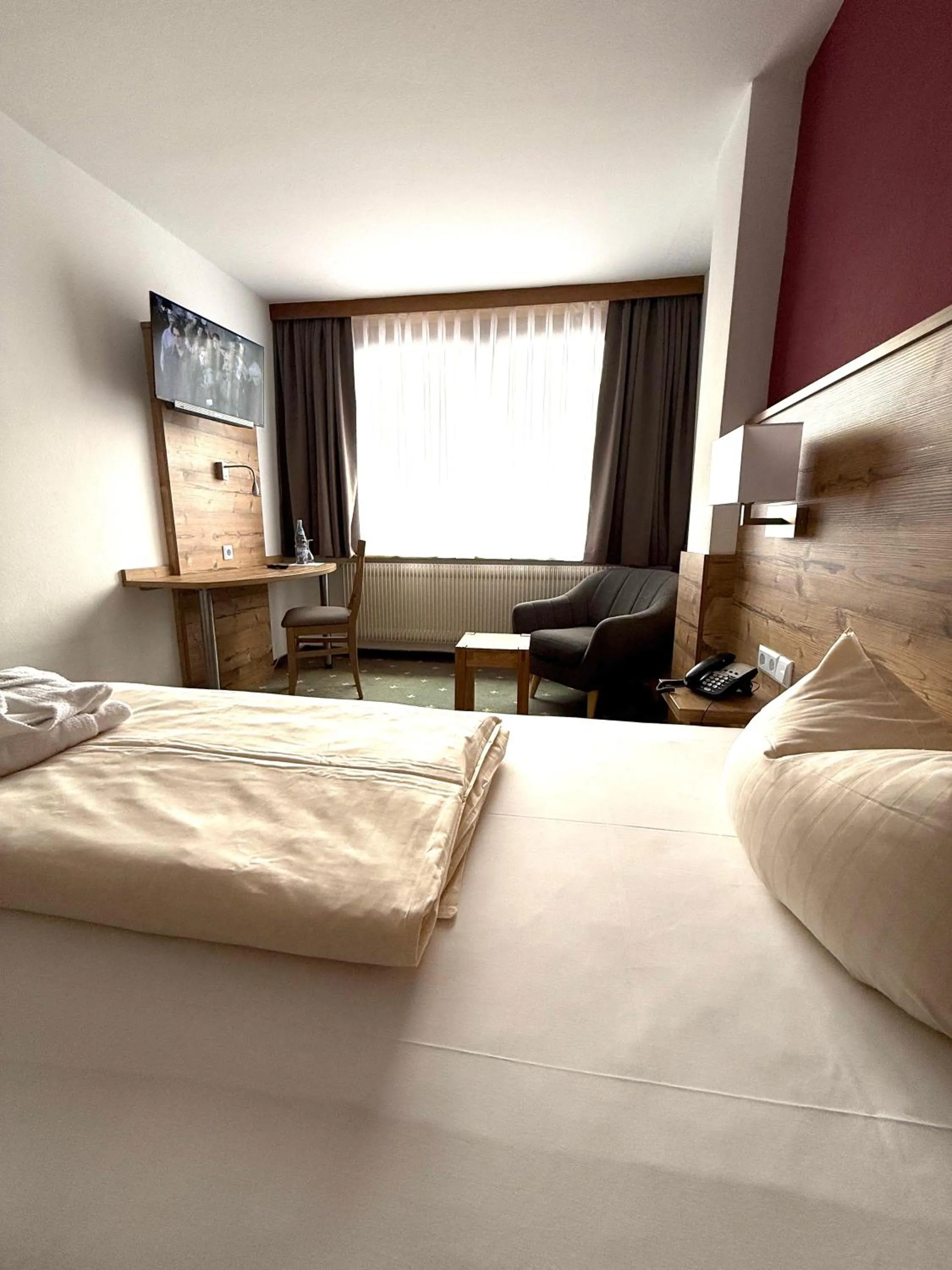 Photo of the whole room, Bed in Hotel Traube Lossburg