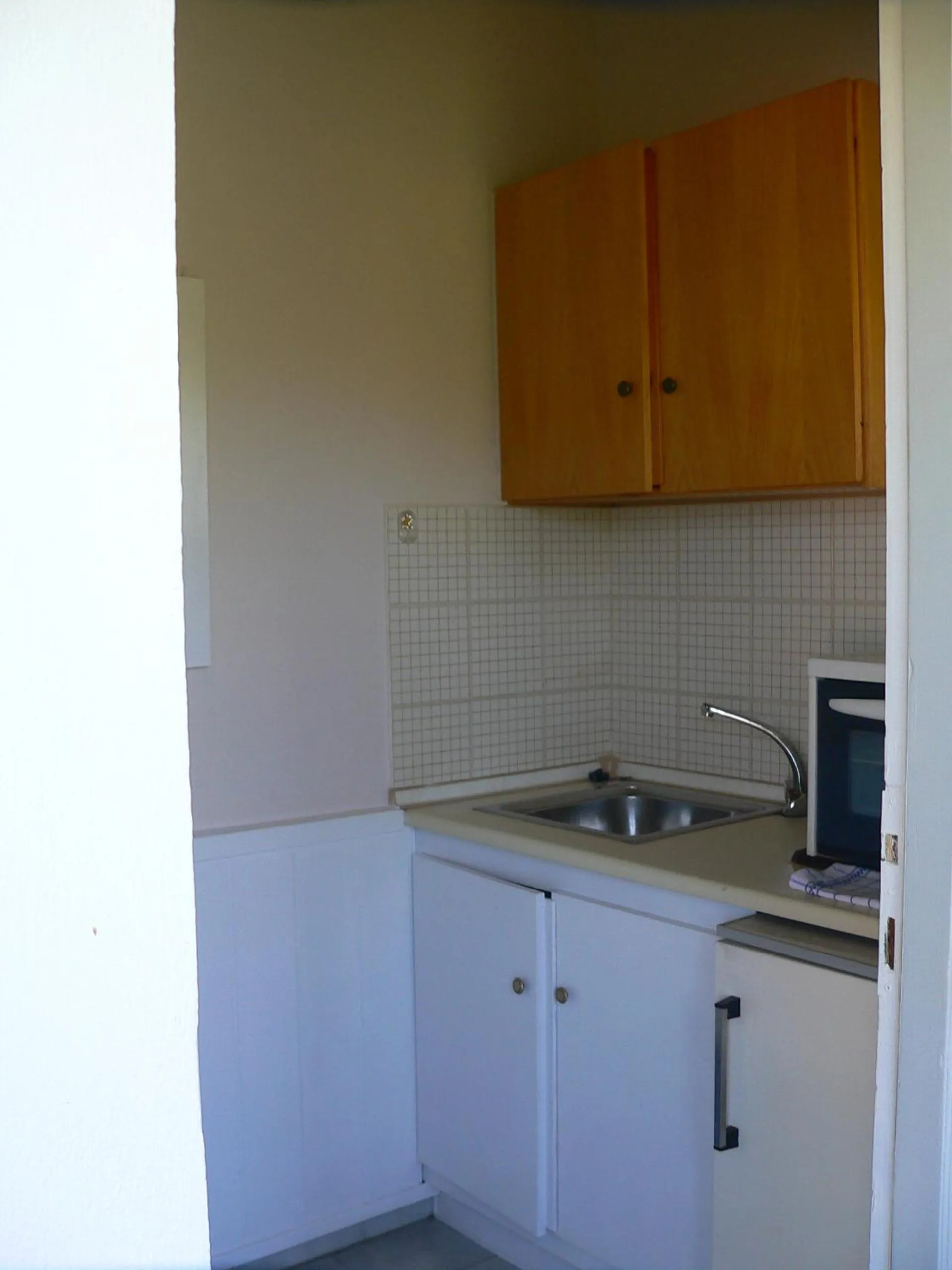 Kitchen or kitchenette in Alexandros Studios Apartments