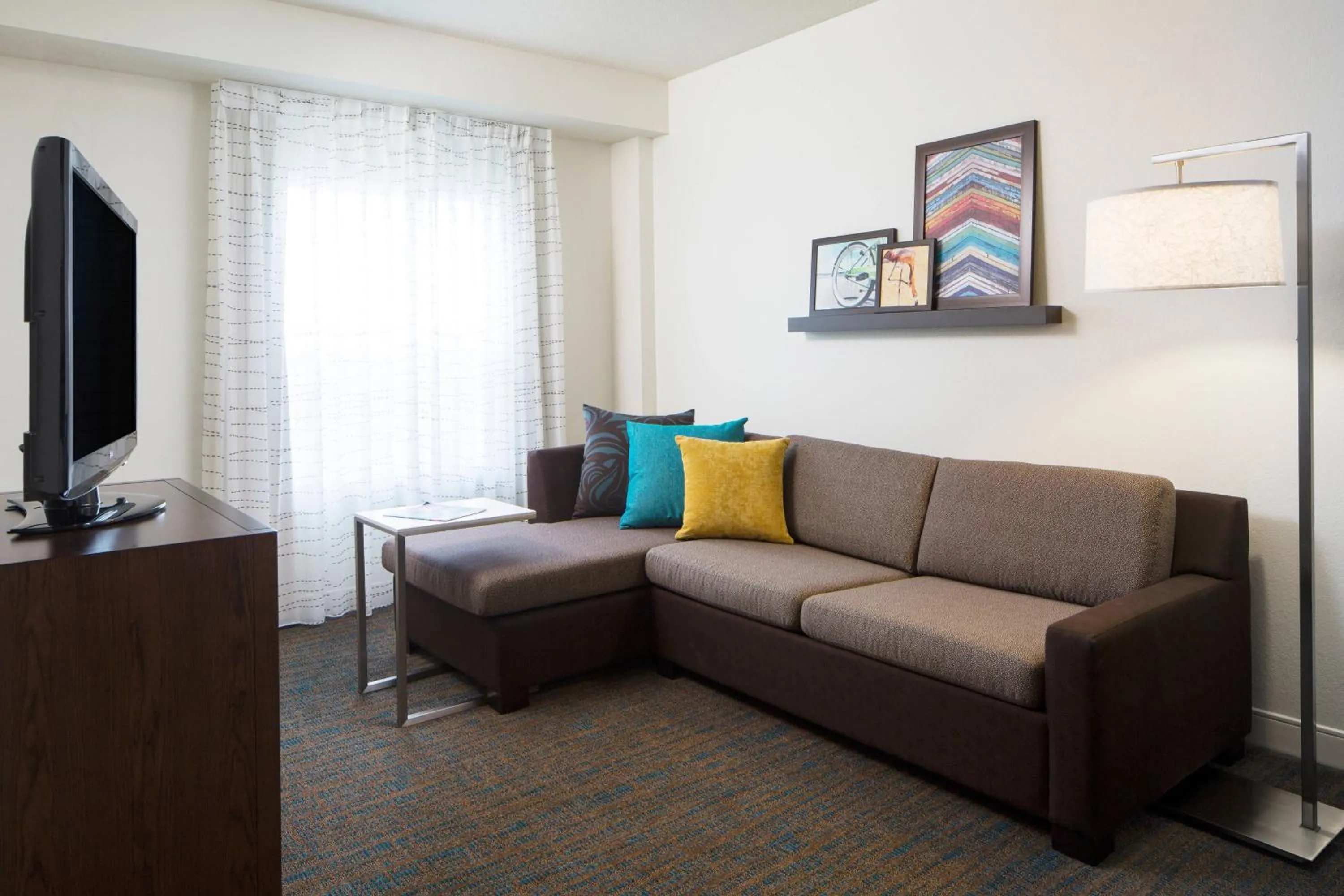 Living room in Residence Inn by Marriott Orlando at SeaWorld