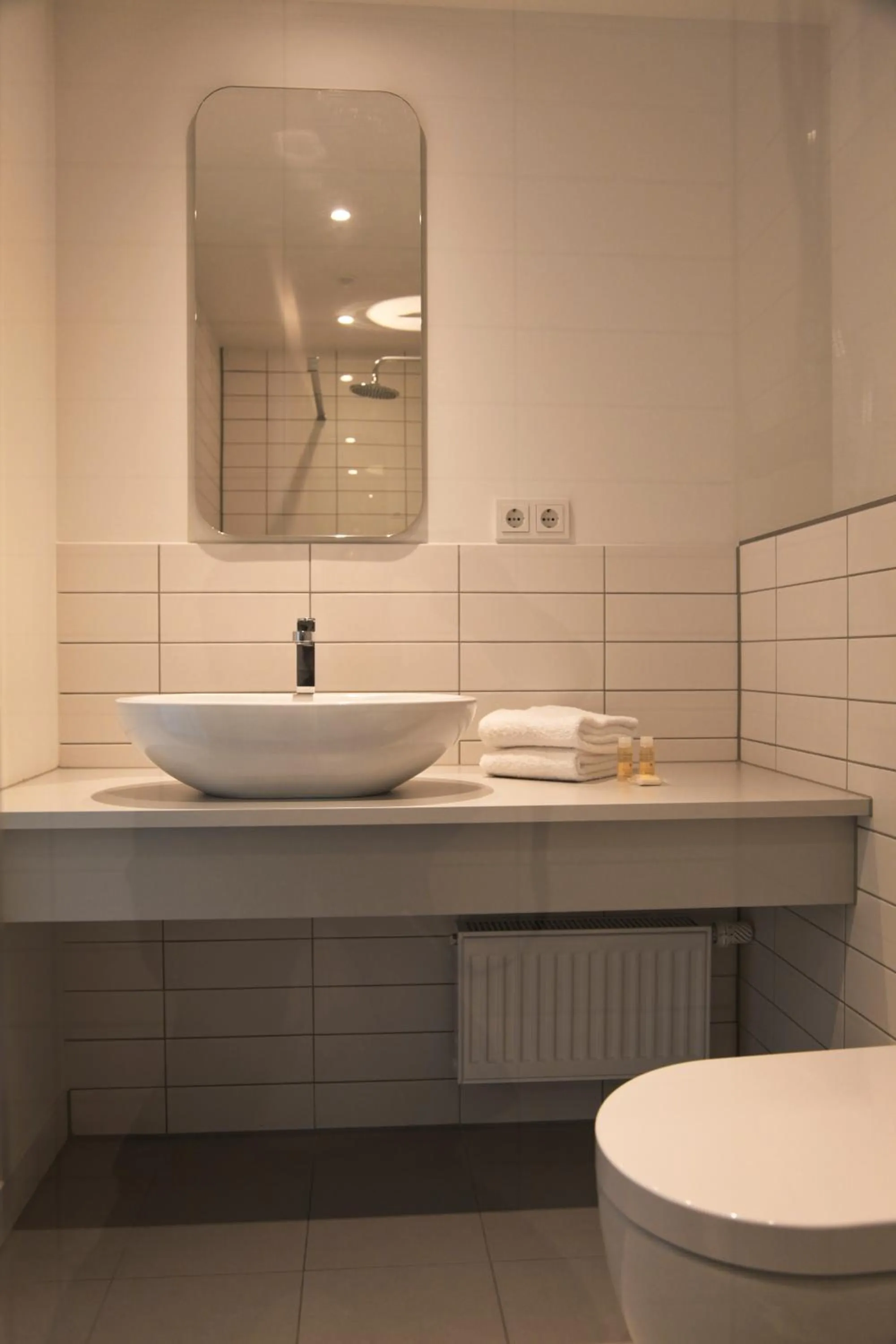 Bathroom in Country Inn Suitenhotel