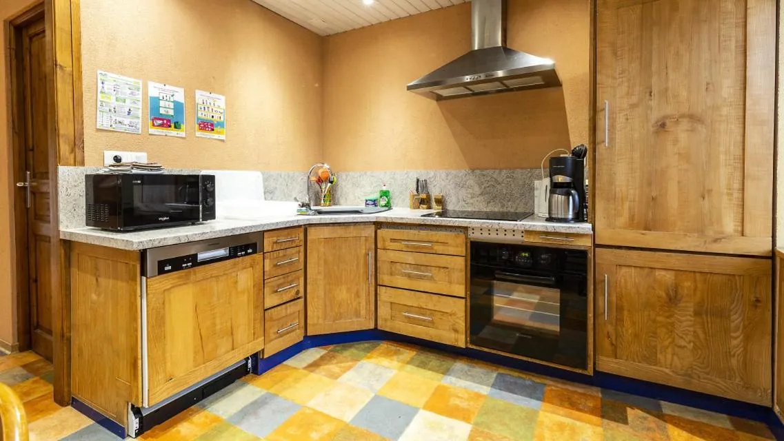 Kitchen or kitchenette in Le Domaine du Verger gîtes et SPA