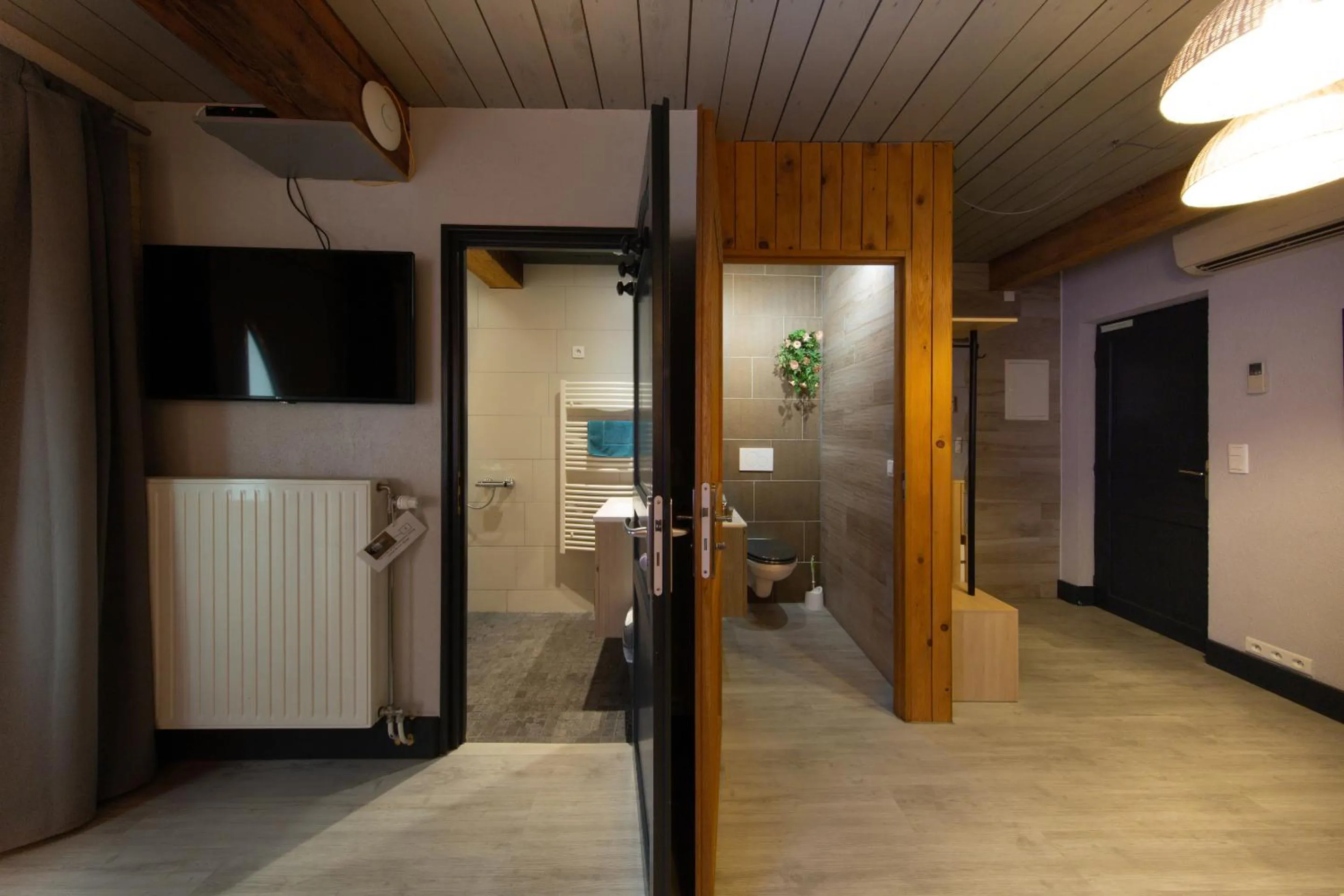 Bedroom in Le Domaine du Verger gîtes et SPA