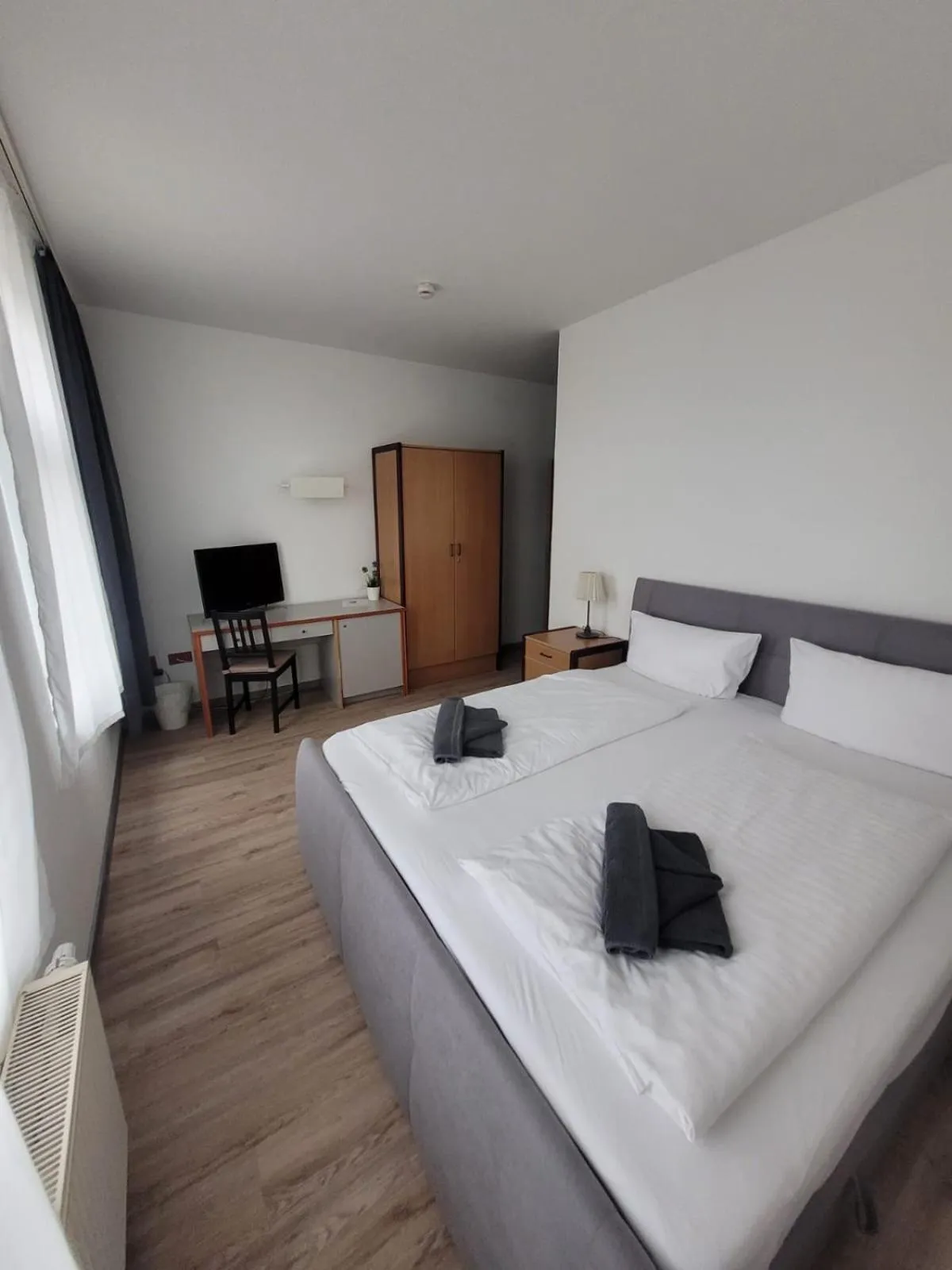 Bed in Appartement-Hotel Rostock