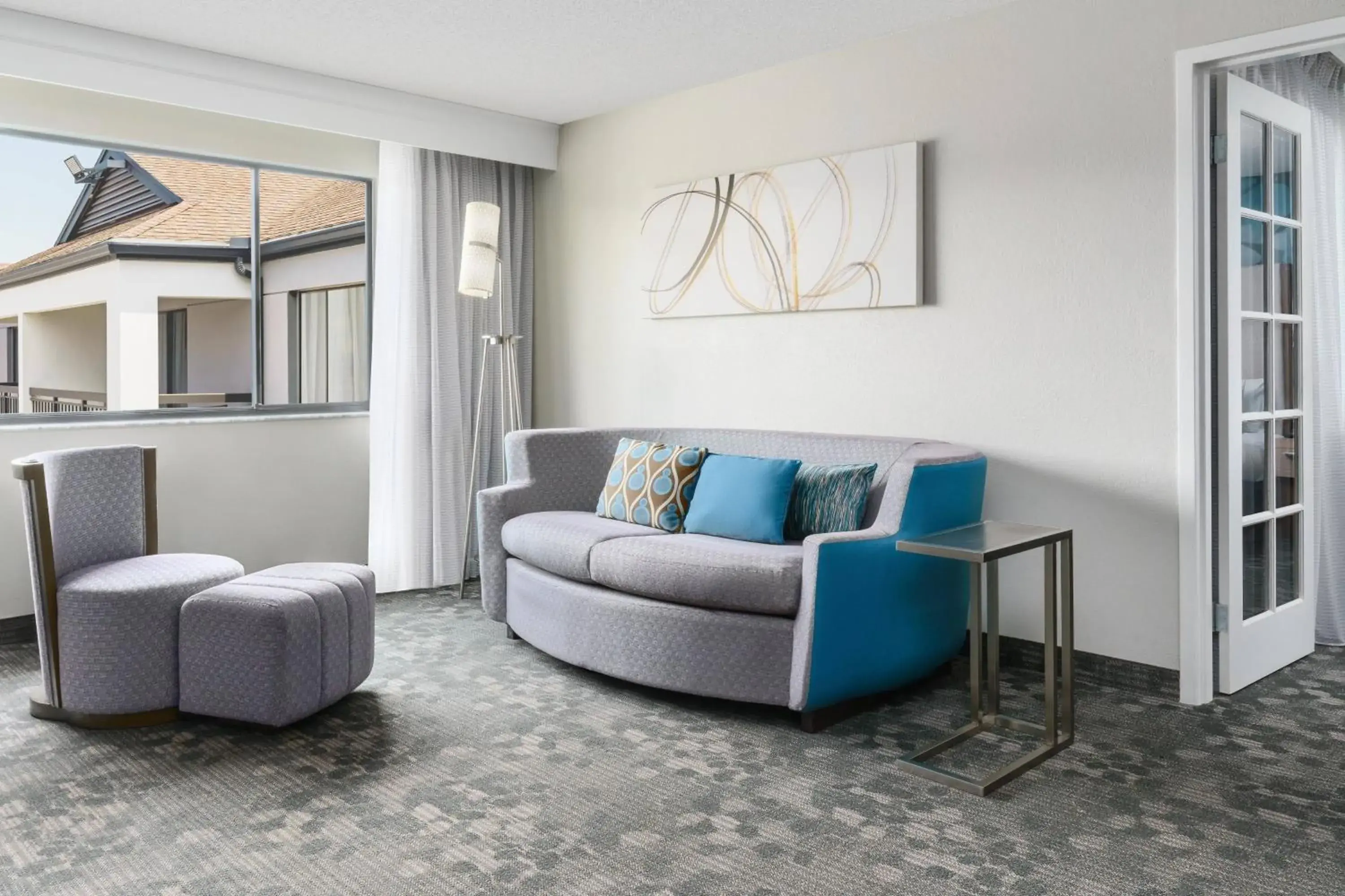 King Suite with Sofa Bed and Roll-in Shower - Mobility and Hearing Accessible in Courtyard by Marriott Orlando Lake Buena Vista at Vista Centre King Suite with Sofa Bed and Roll-in Shower - Mobility and Hearing Accessible in Courtyard by Marriott Orlando Lake Buena Vista at Vista Centre