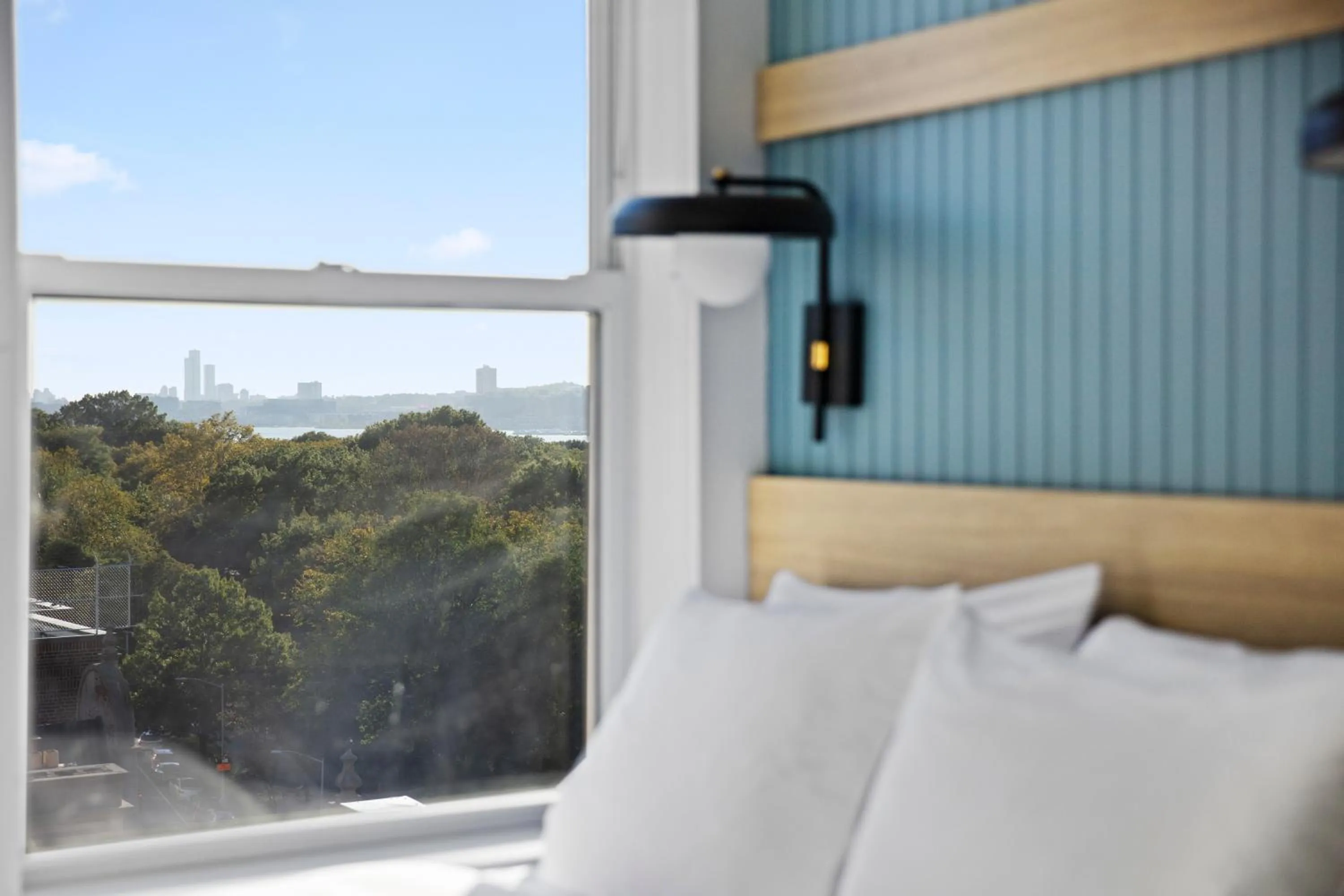 Bed in Riverside Tower Hotel