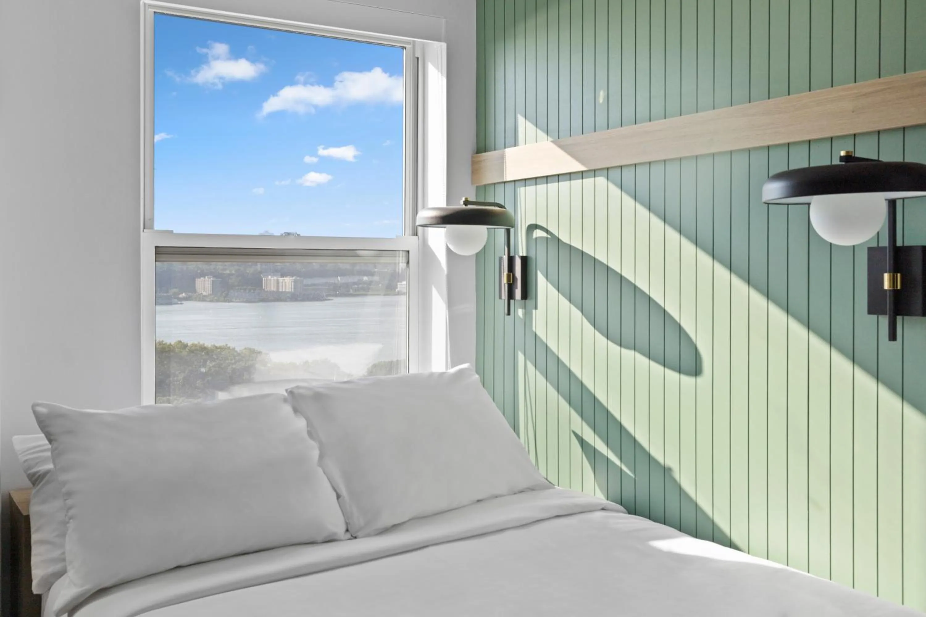 River view, Bed in Riverside Tower Hotel