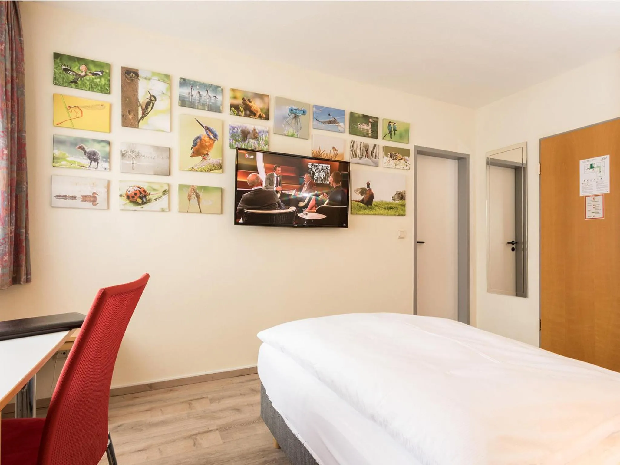 Photo of the whole room, Bed in Hotel & Wirtshaus Hansen