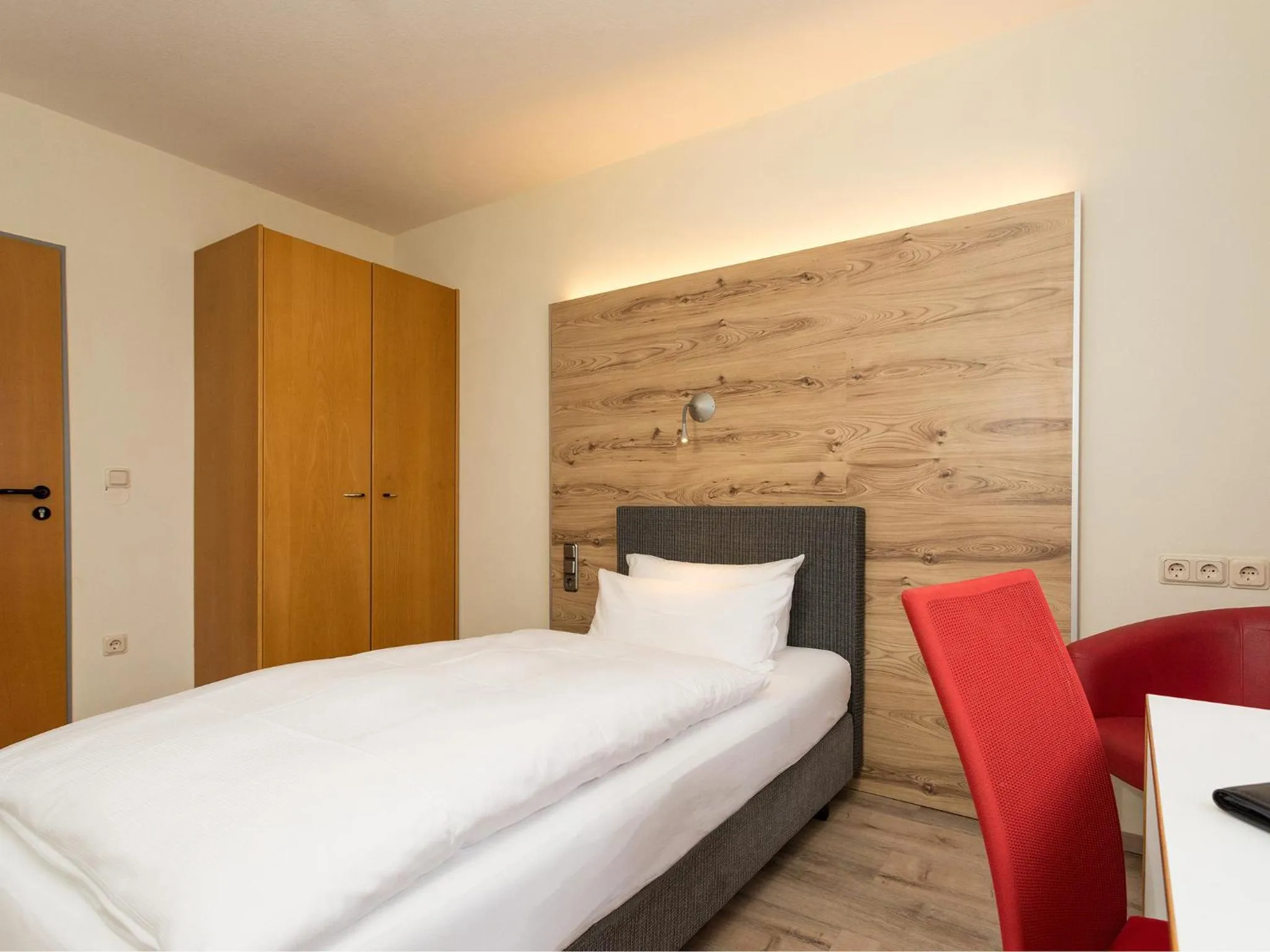 Photo of the whole room, Bed in Hotel & Wirtshaus Hansen