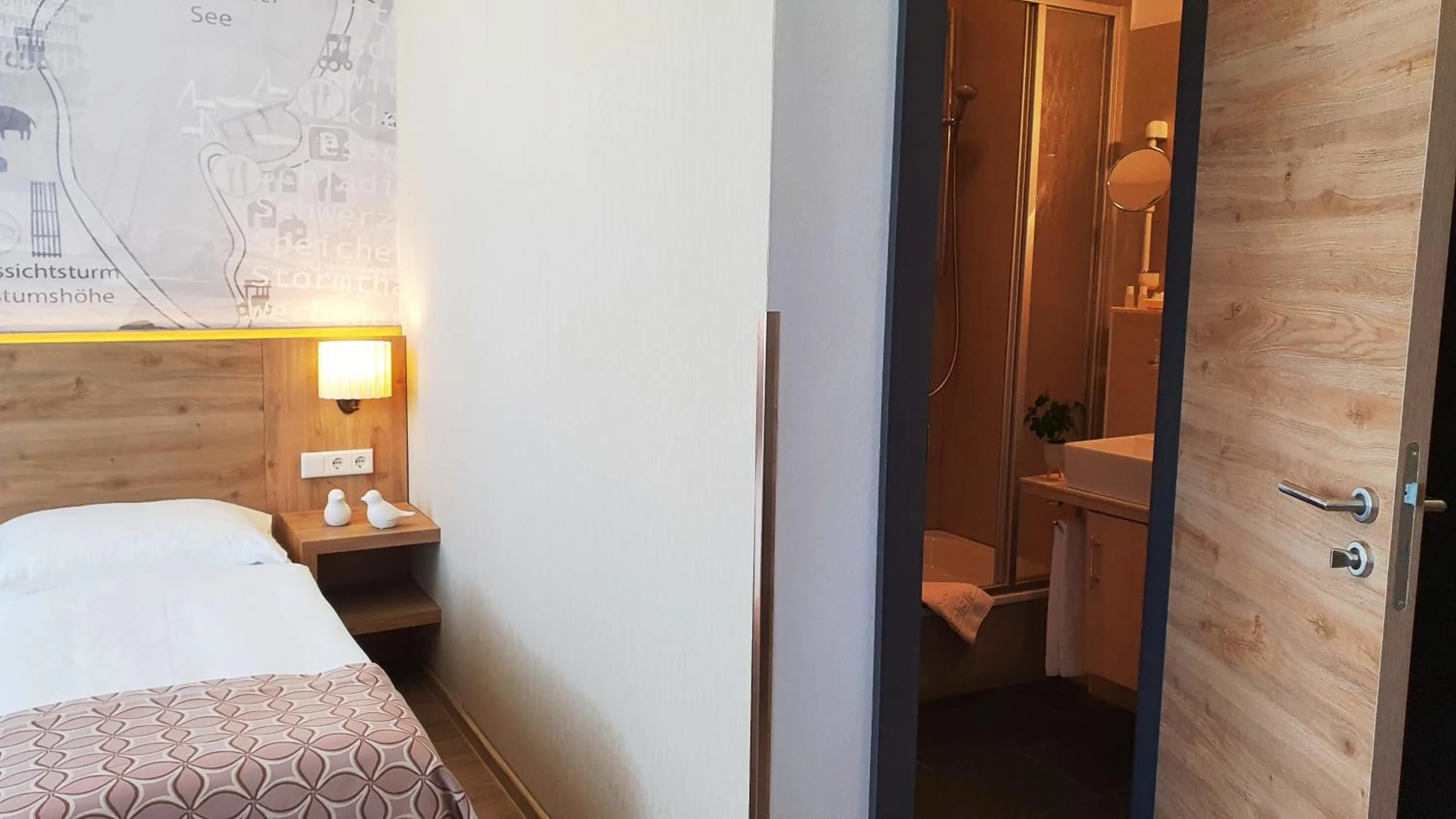 Bathroom, Bed in Hotel Atlas Halle