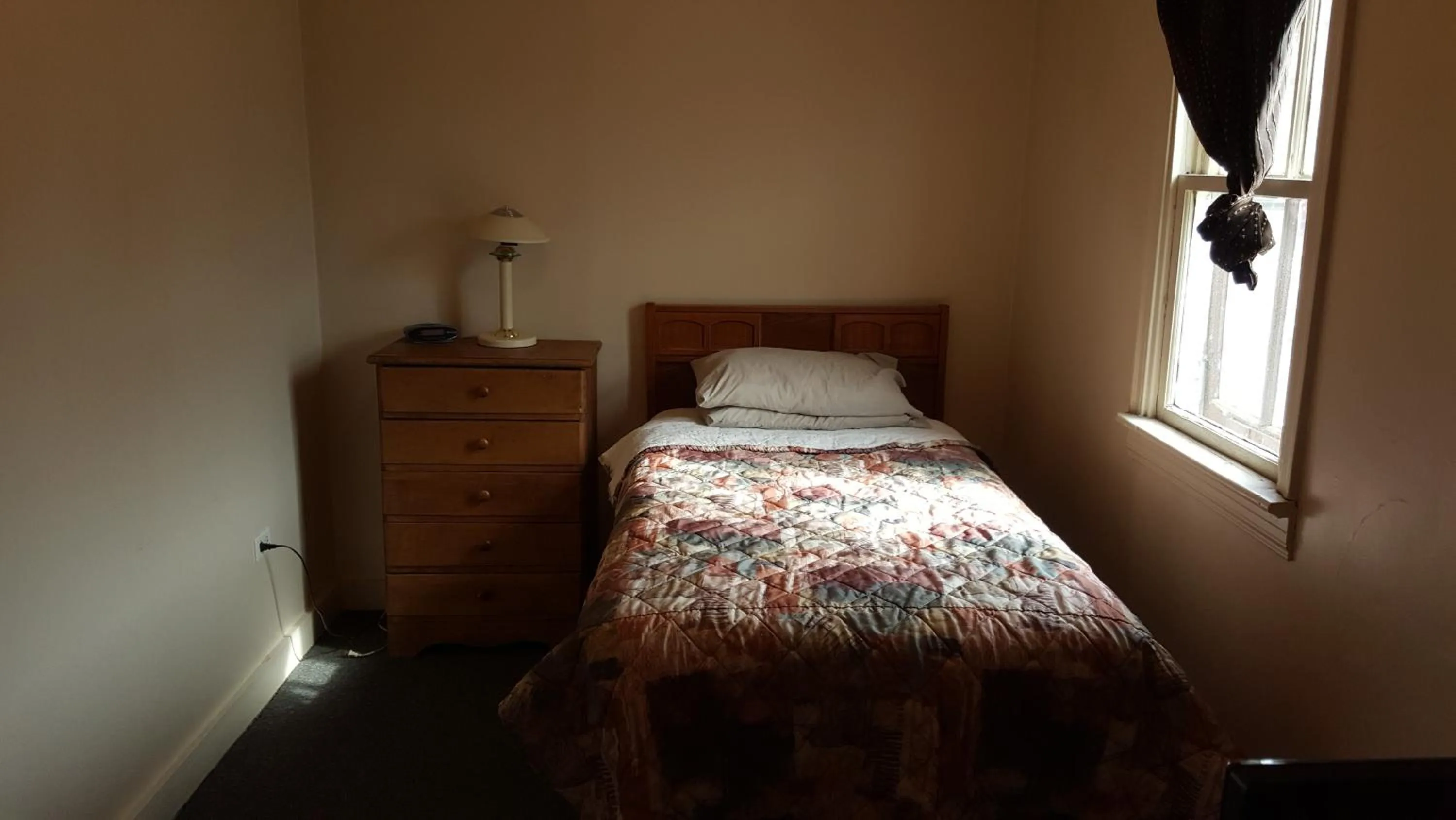 Bedroom in Hat Motel