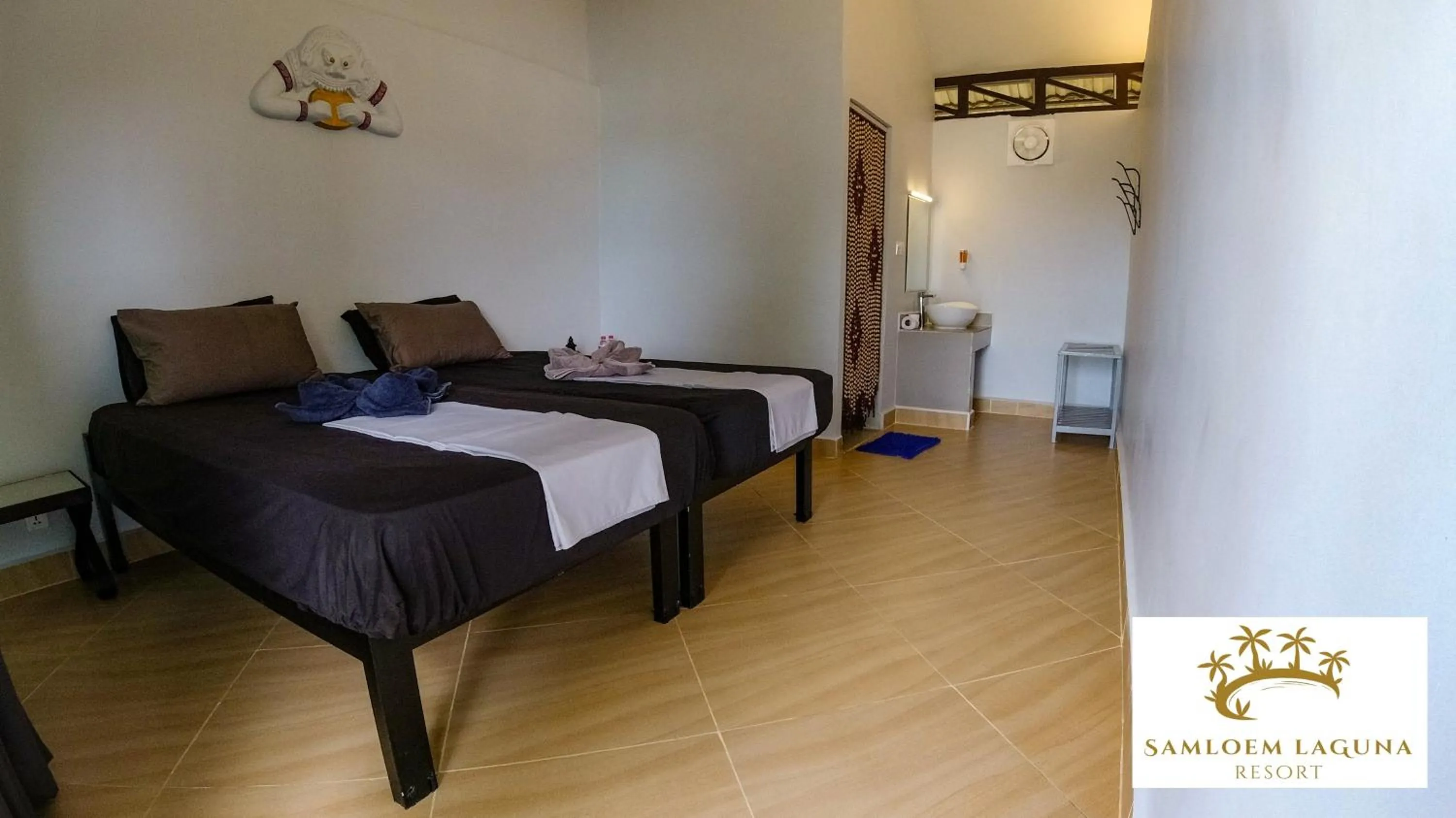 Bed in Samloem Laguna Resort