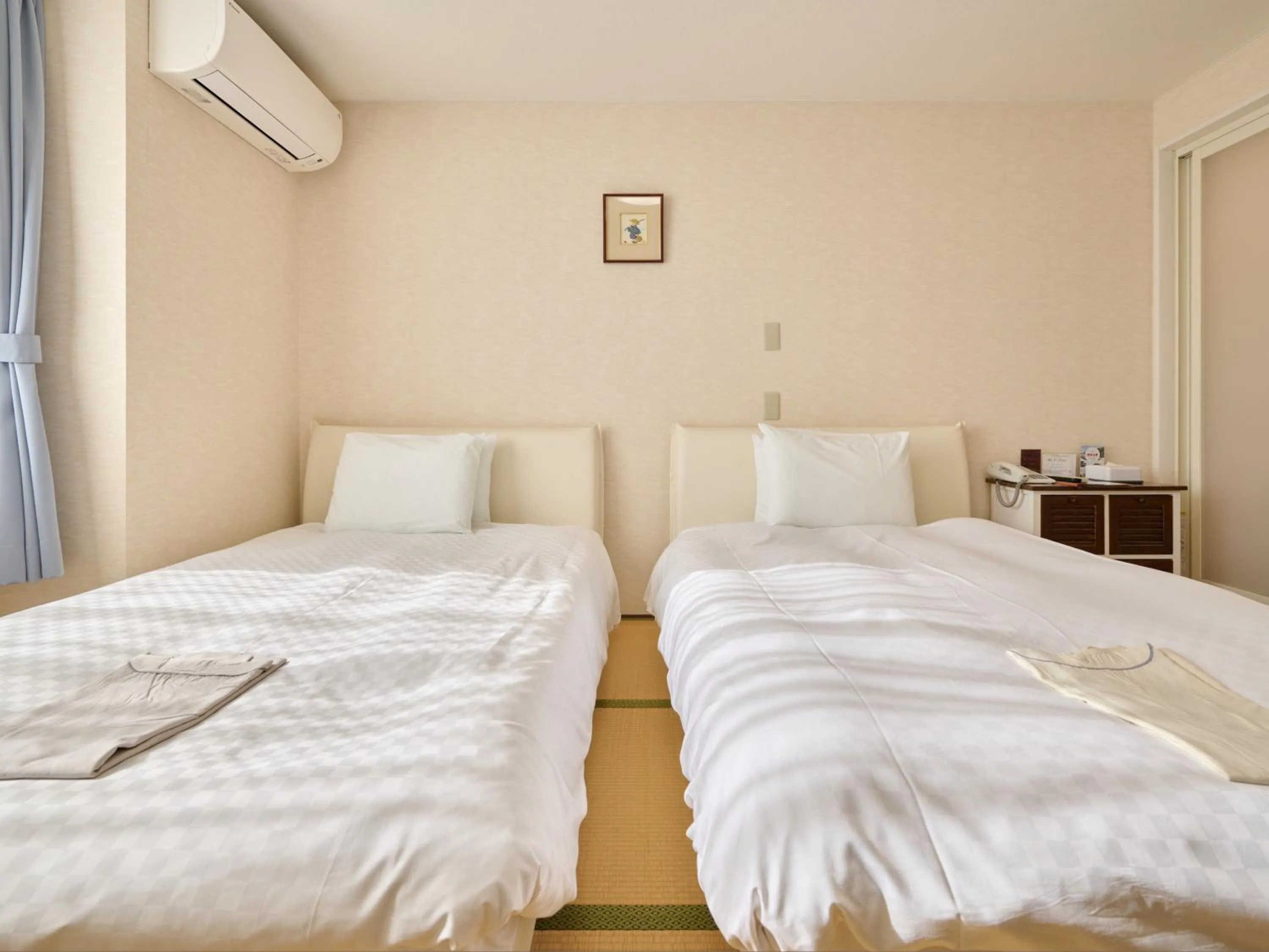 Photo of the whole room, Bed in Okasan Hotel