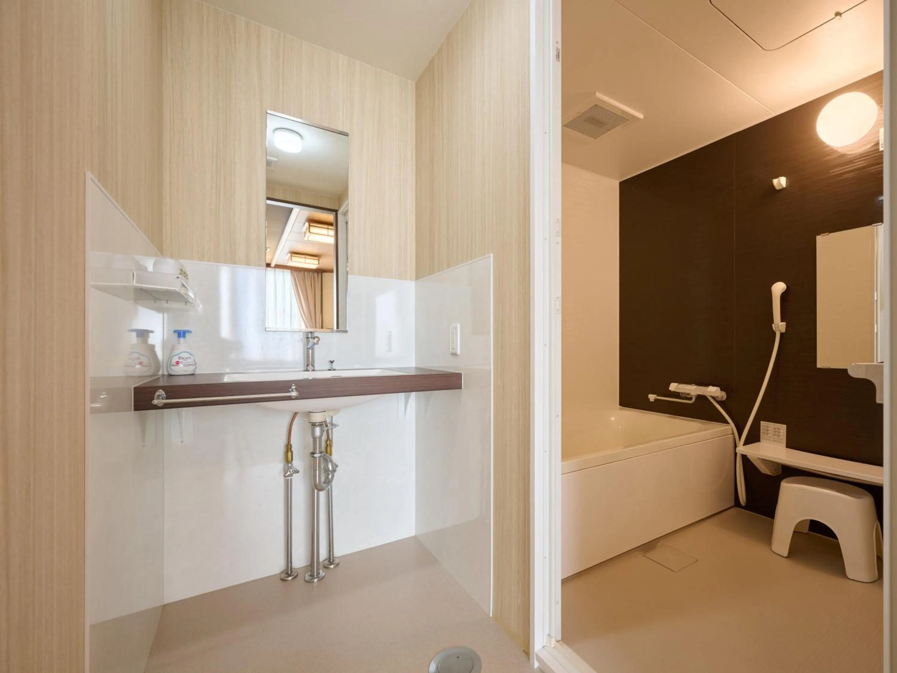 Bathroom in Okasan Hotel