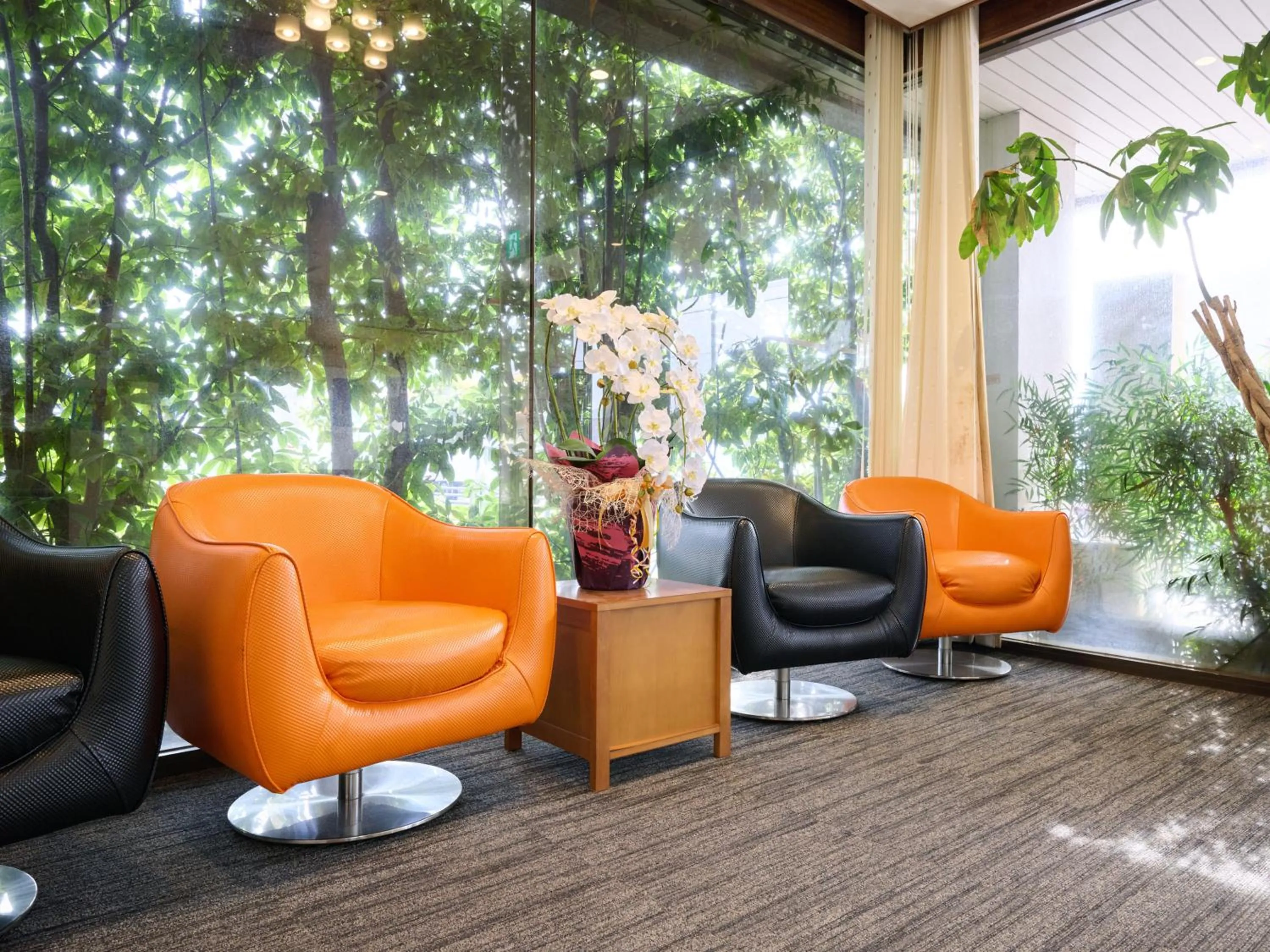 Lobby or reception in Okasan Hotel