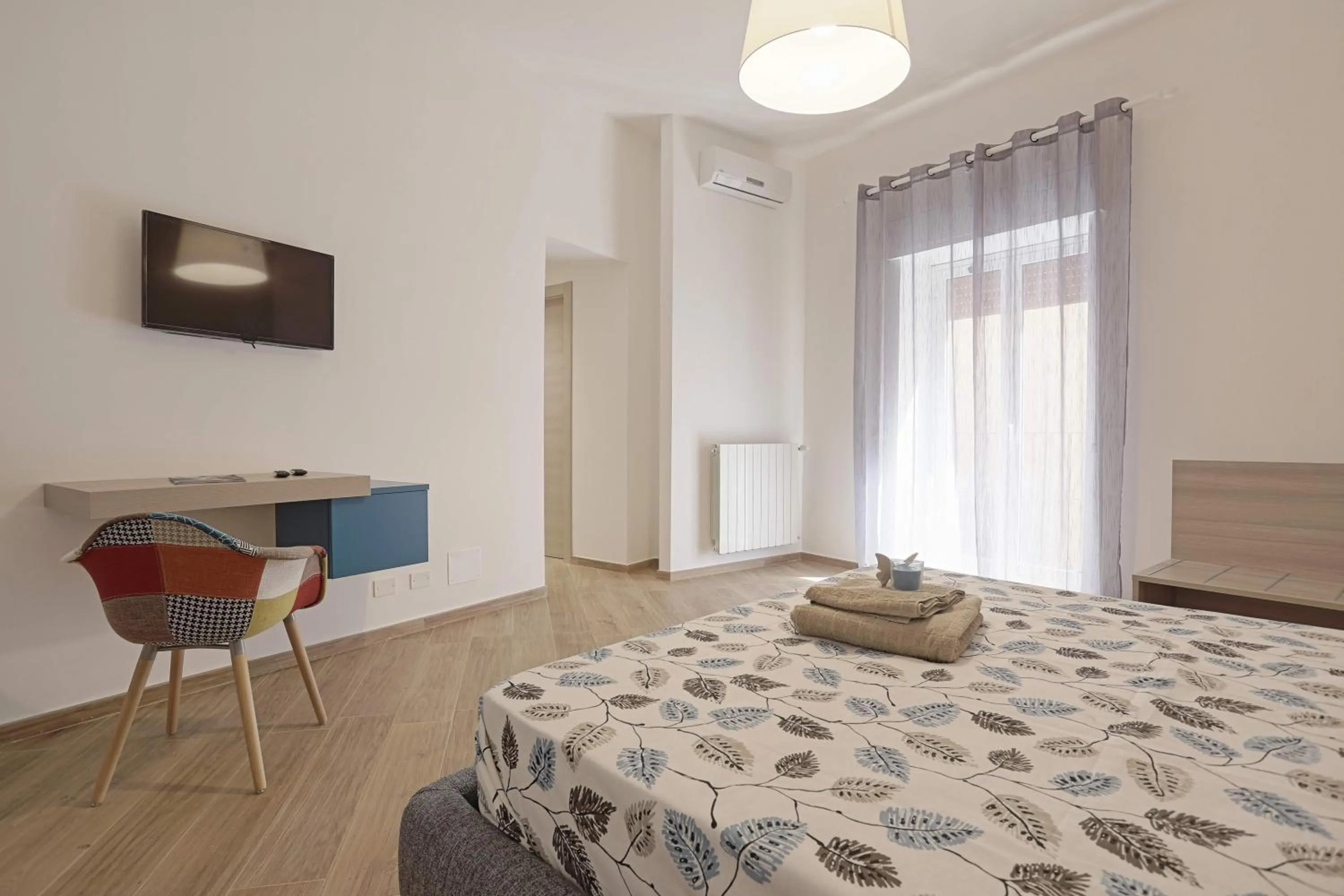 Photo of the whole room, Bed in Le Maioliche