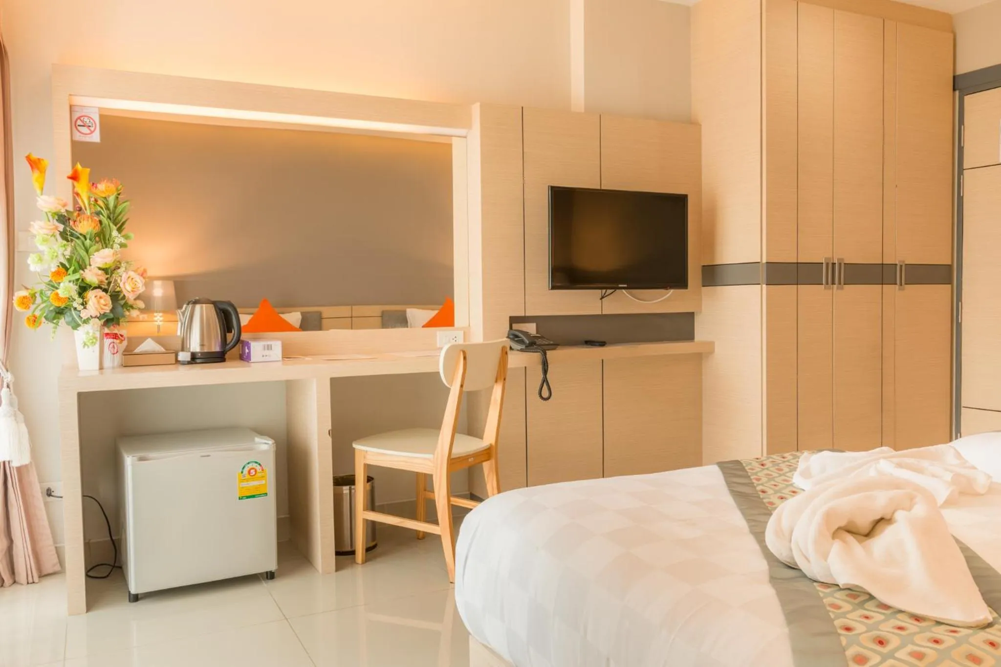 Bed in The Smart Hotel Hat Yai