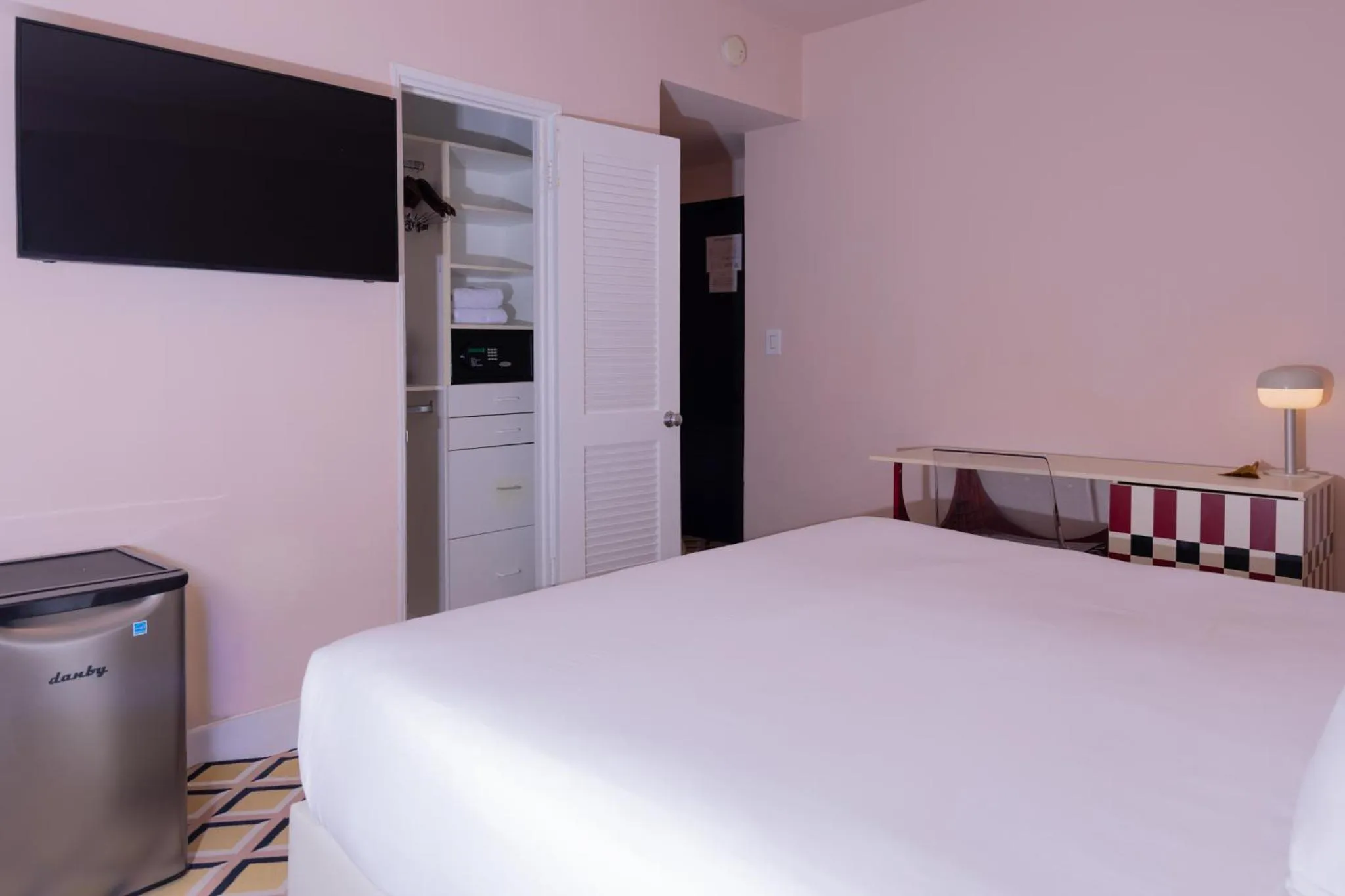 Bed in Crest Hotel Suites