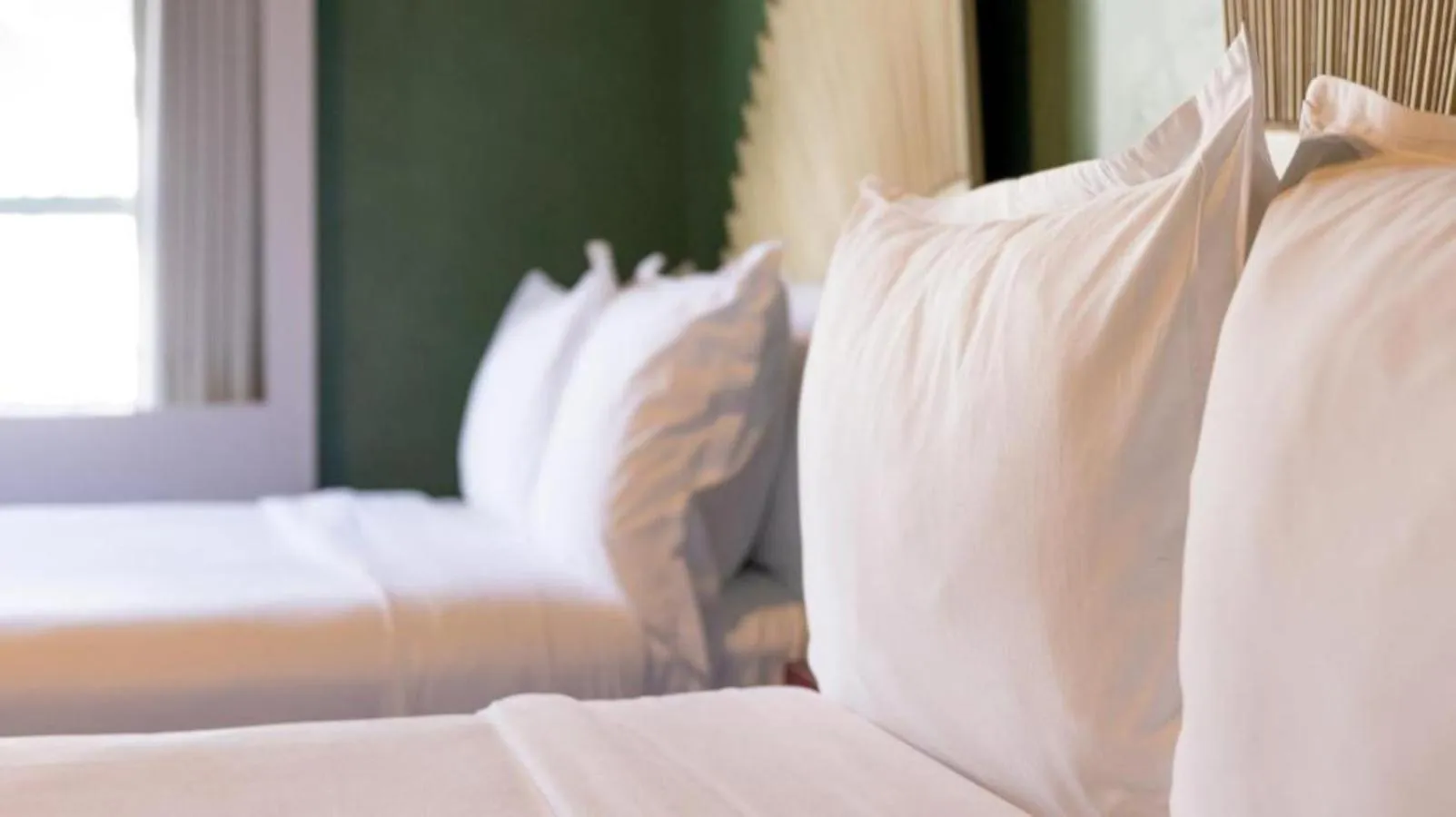 Bed in Crest Hotel Suites