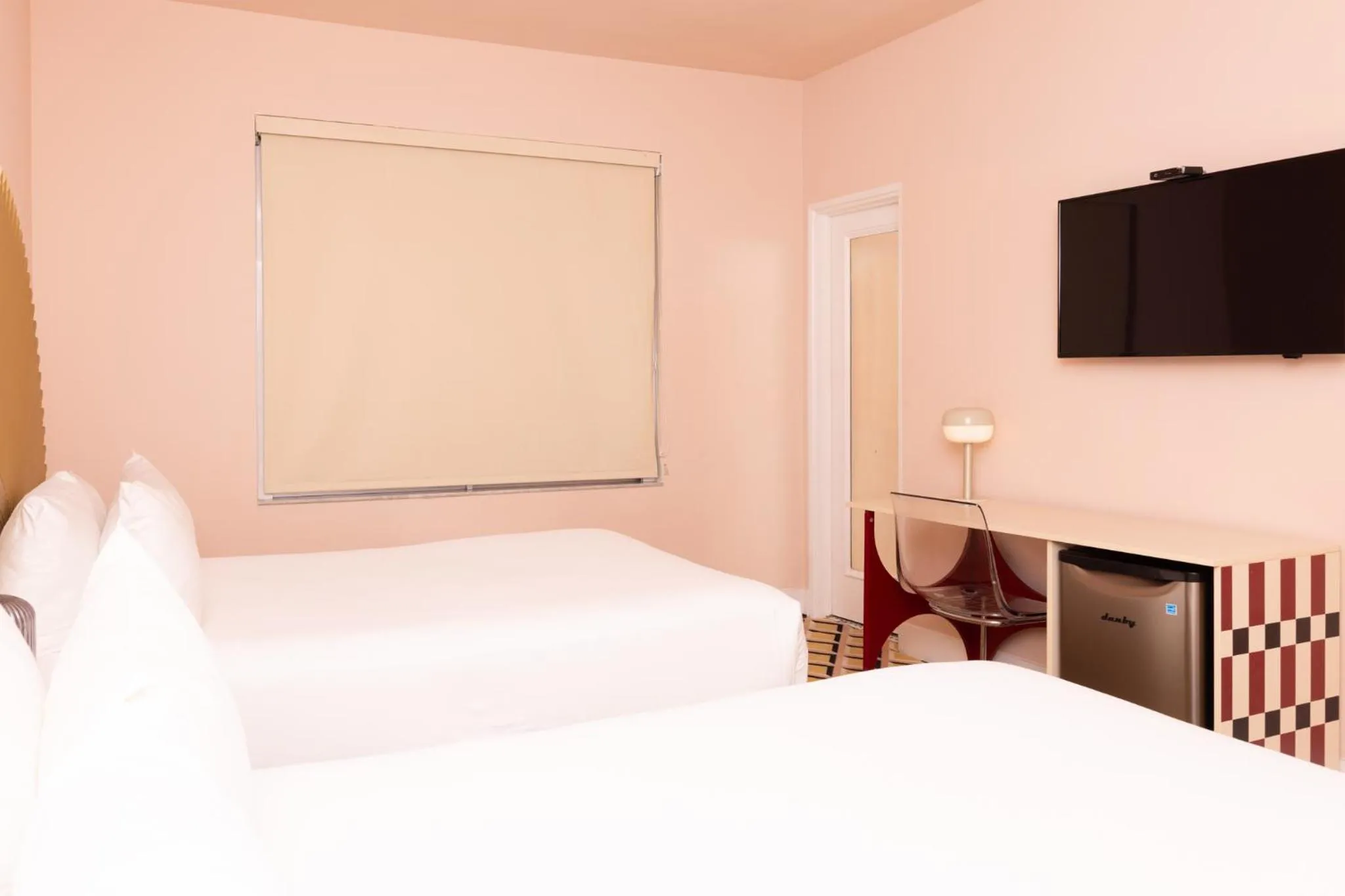 Bed in Crest Hotel Suites