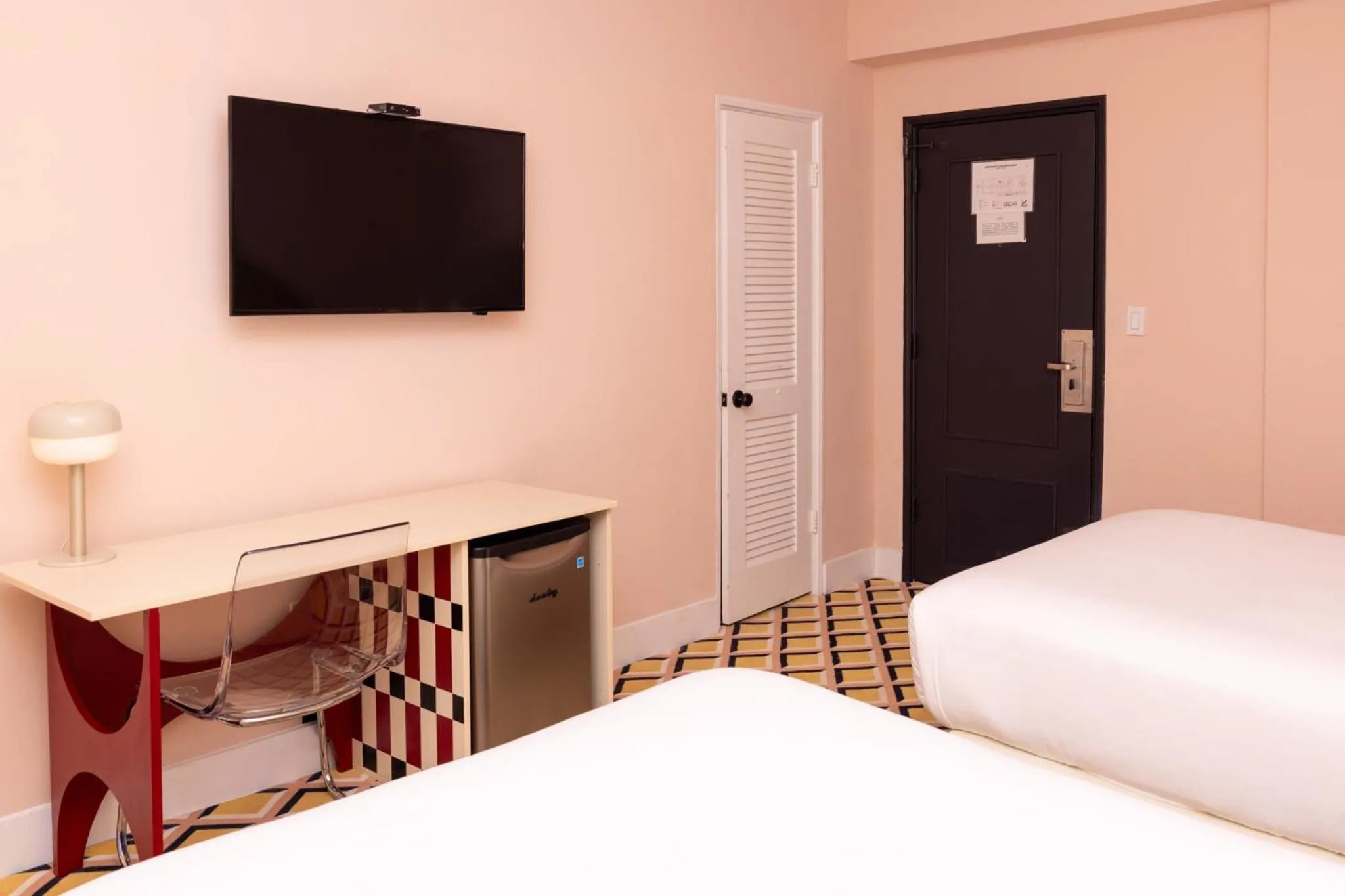 Bed in Crest Hotel Suites