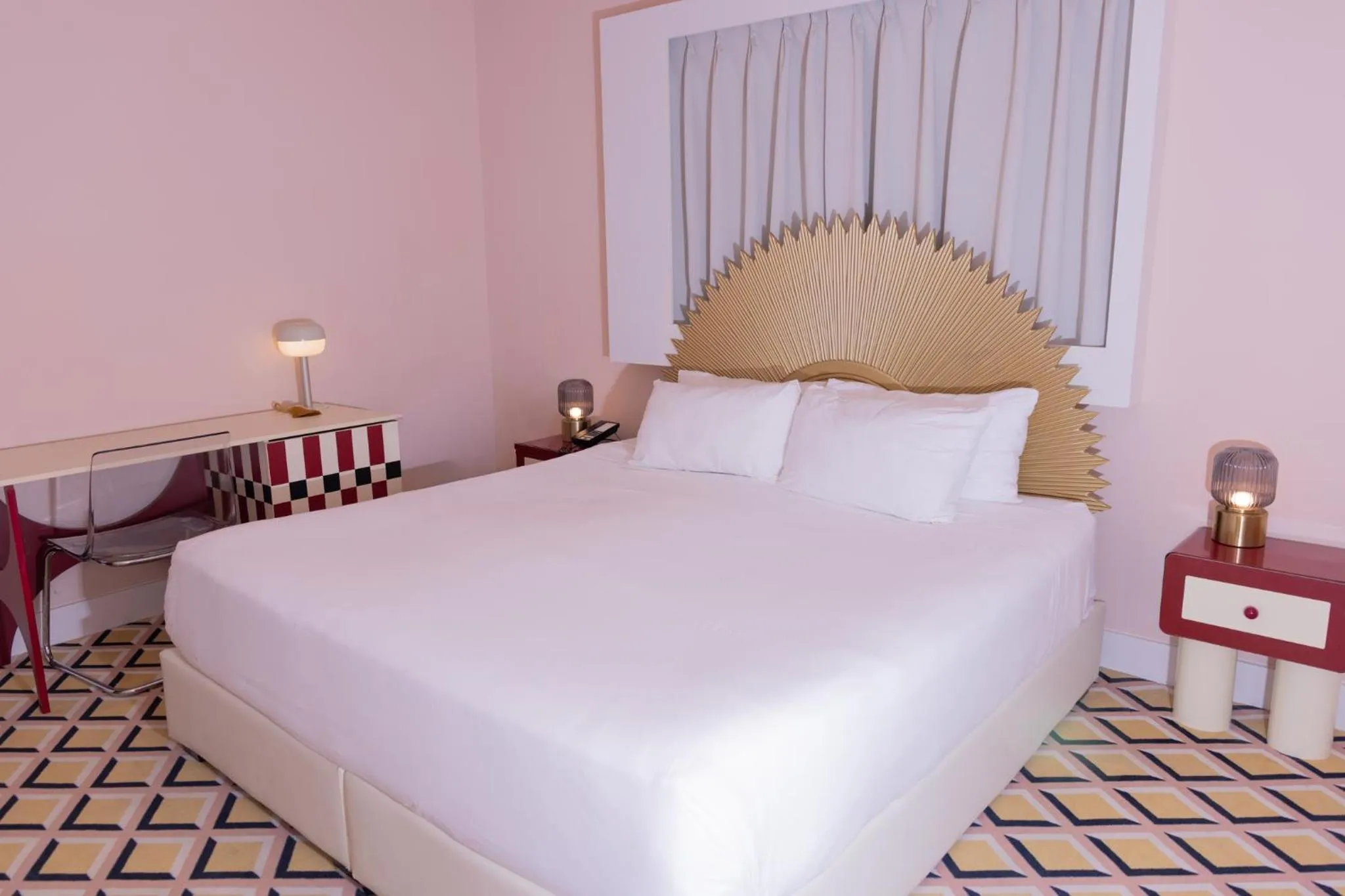 Bed in Crest Hotel Suites