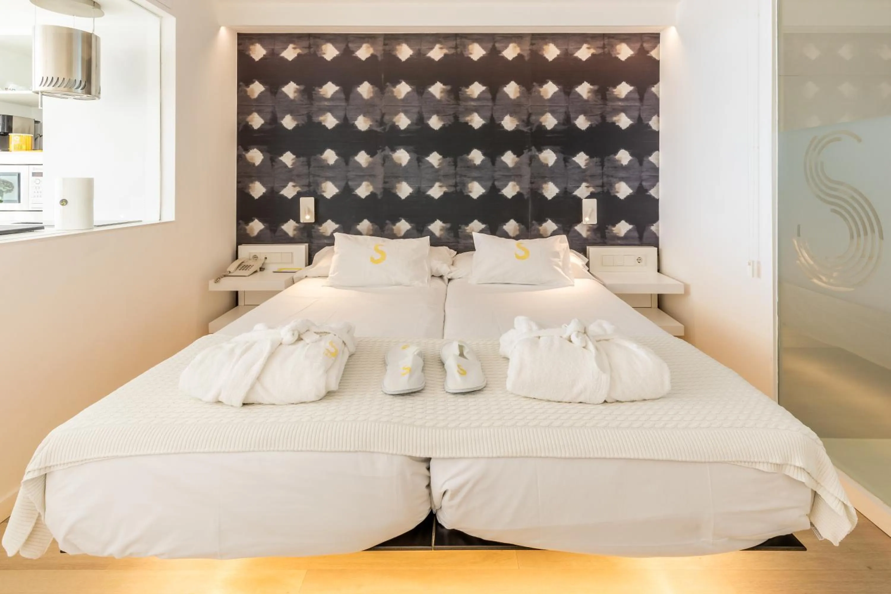 Bed in Sud Ibiza Suites