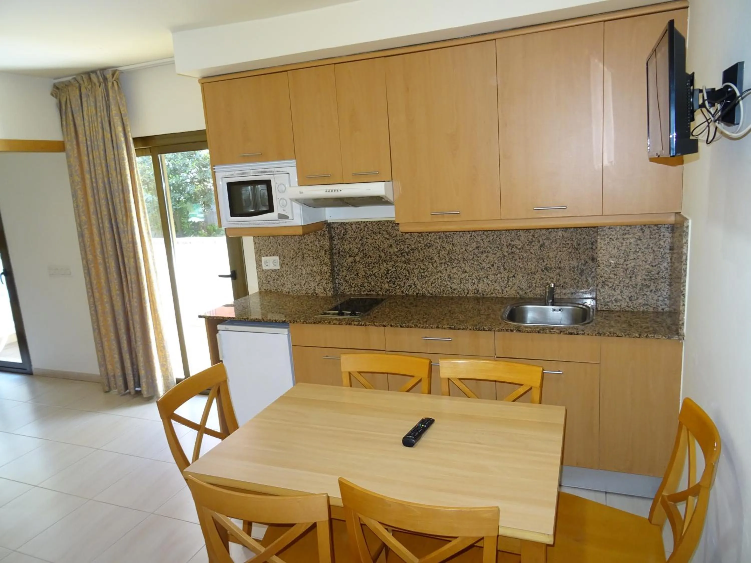Kitchen or kitchenette in Apartamentos Selvapark