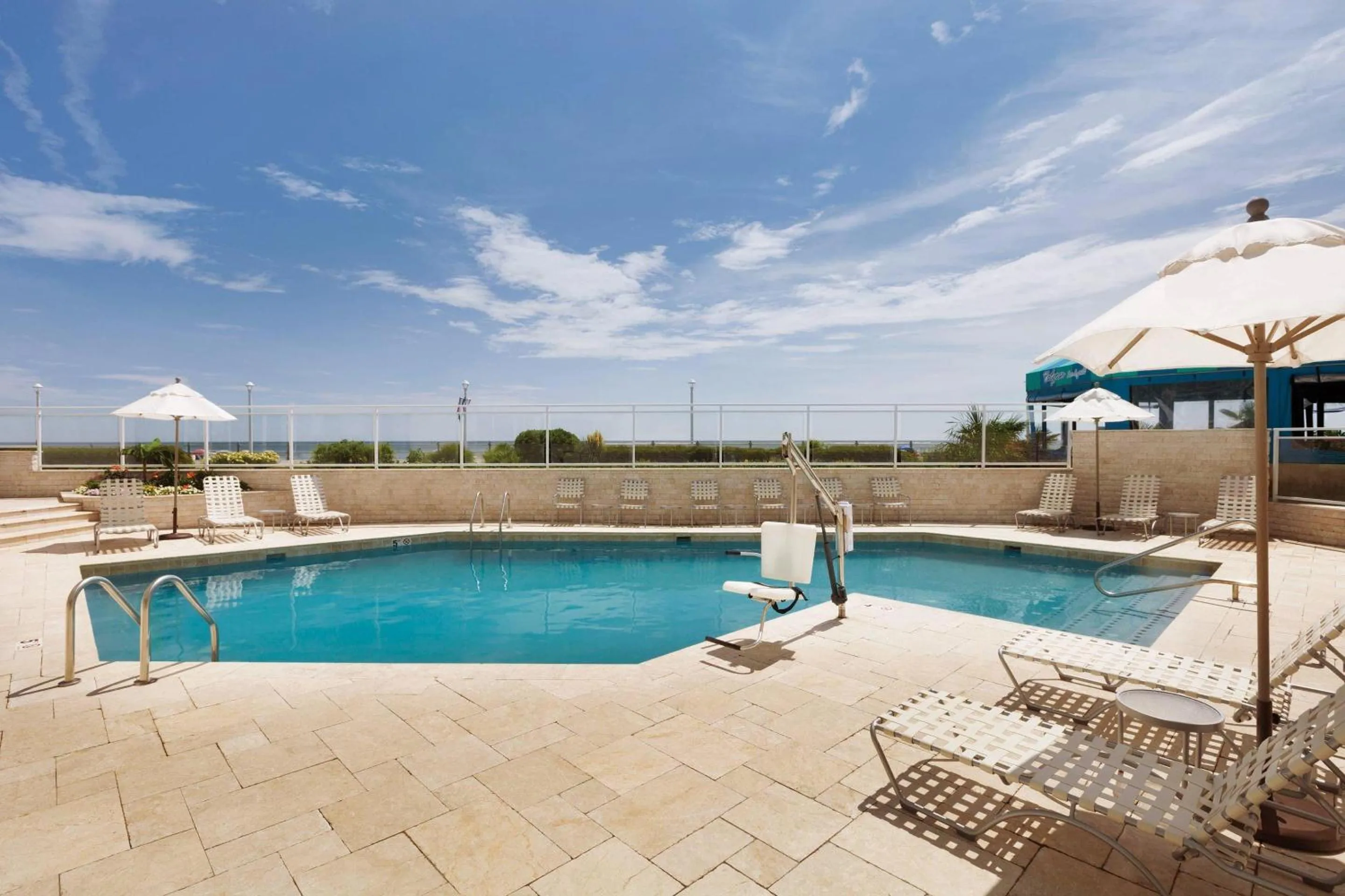 Swimming pool in Surfbreak Virginia Beach Oceanfront, an Ascend Collection Hotel