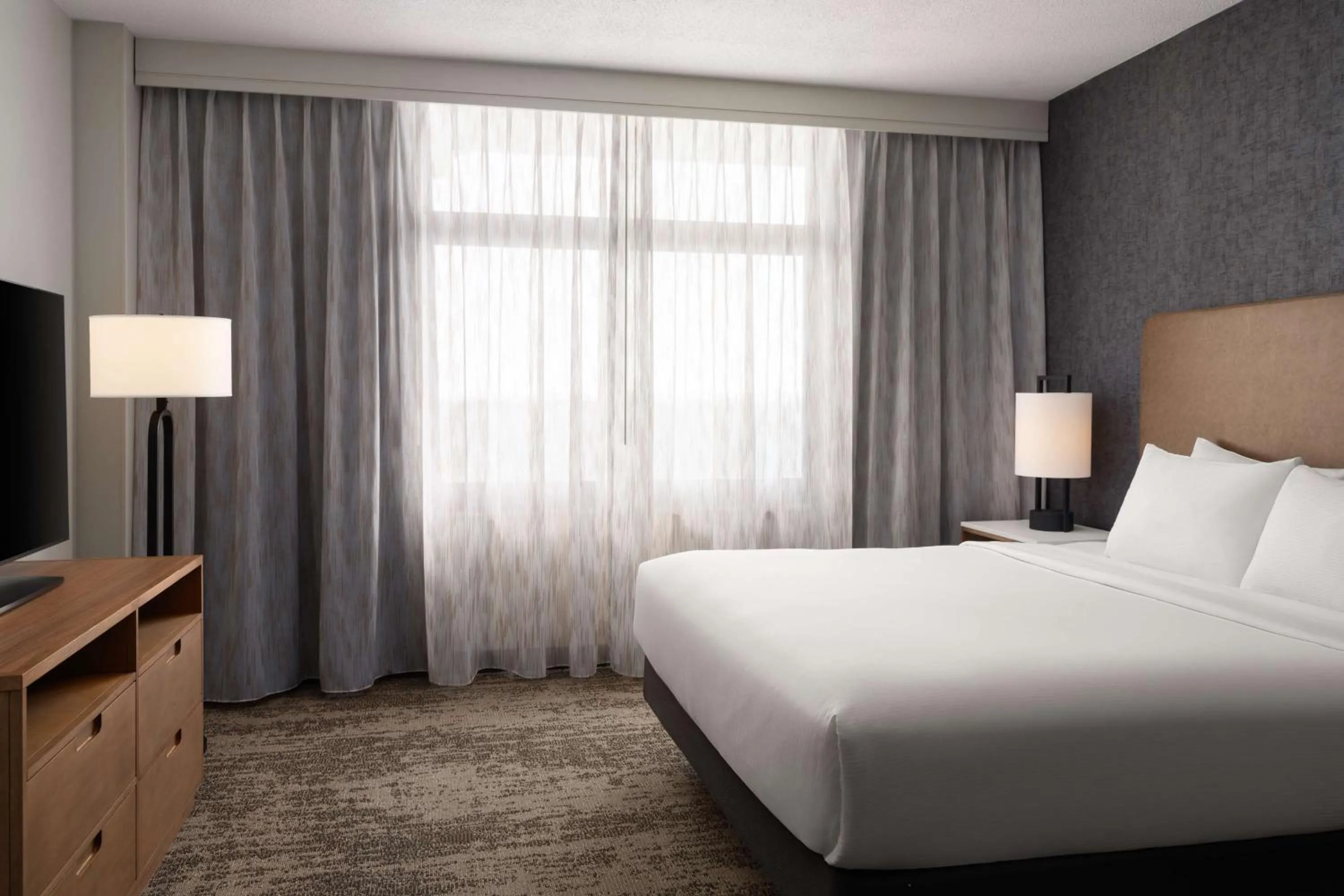 Bed in Embassy Suites by Hilton at Hot Springs Convention Center