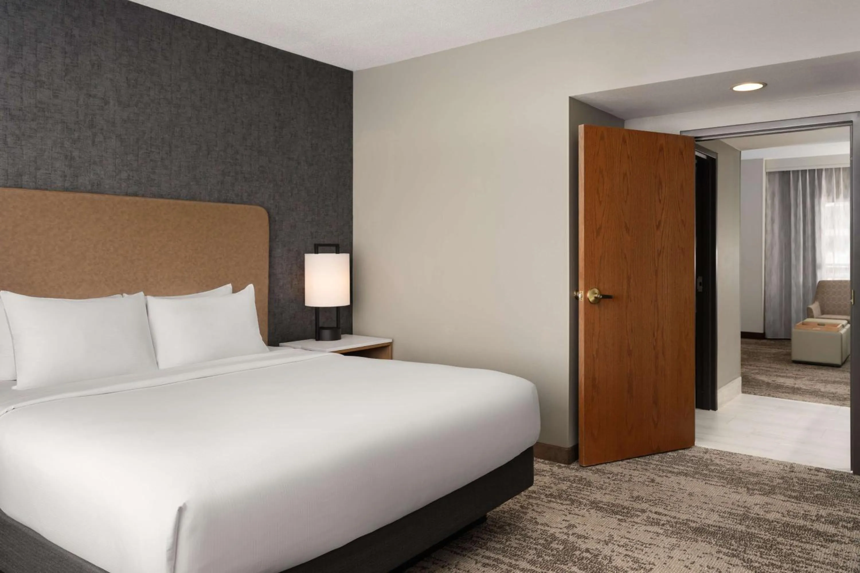 Bed in Embassy Suites by Hilton at Hot Springs Convention Center