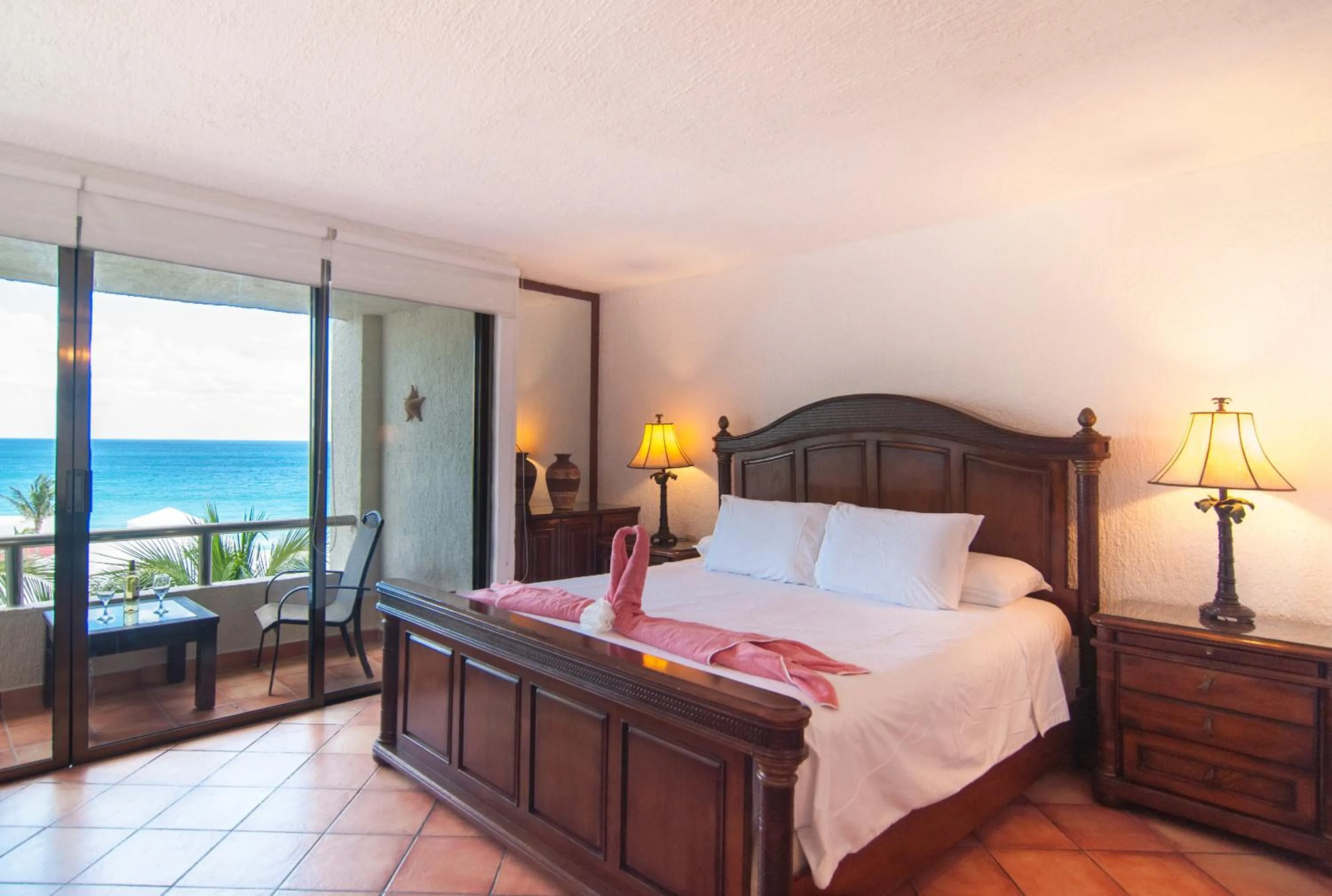 Bed in Solymar Condo Beach Resort by Casago