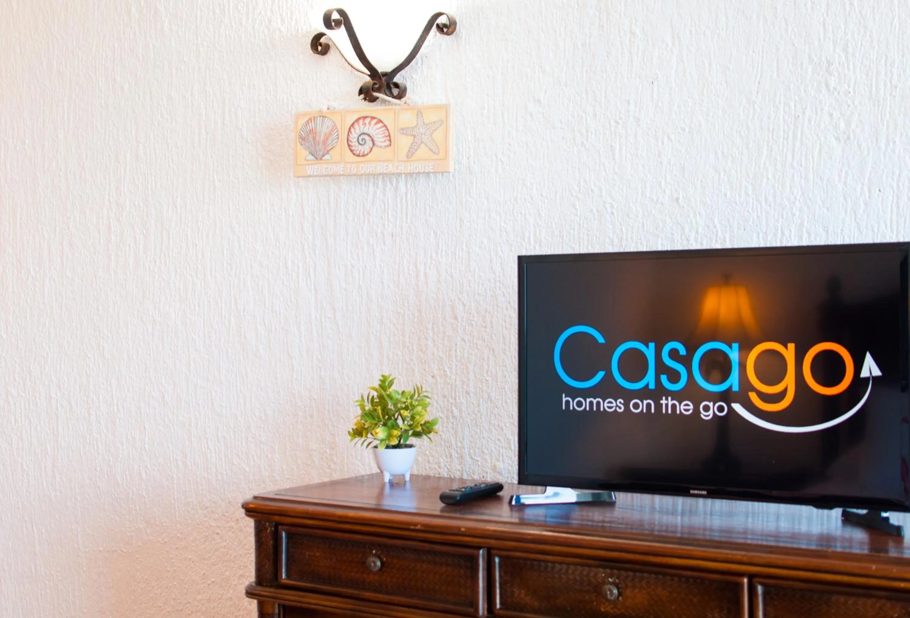 TV and multimedia in Solymar Condo Beach Resort by Casago