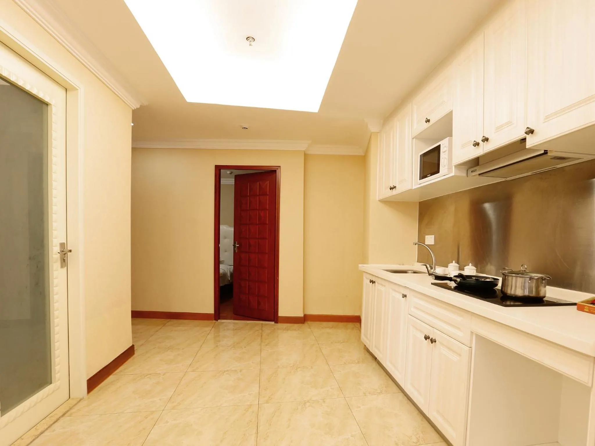 Kitchen or kitchenette in Guangzhou Boman Apartment Zhengjia Huanshi Branch