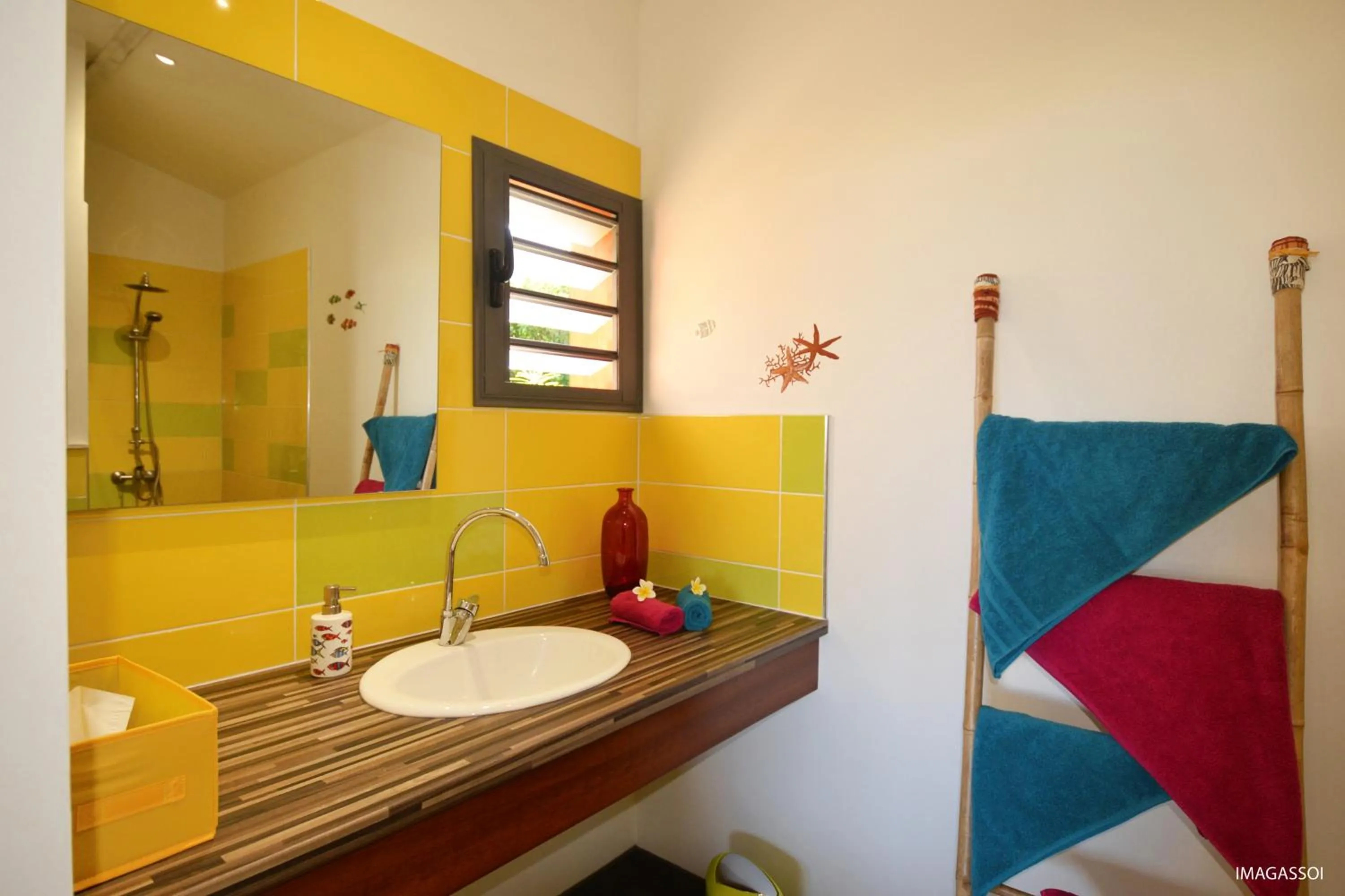 Bathroom in Poz Lagon - chambre d'hôtes - Bungalow pour 2 personnes - Jacuzzi privatif - petit déjeuner - Vue sur le lagon