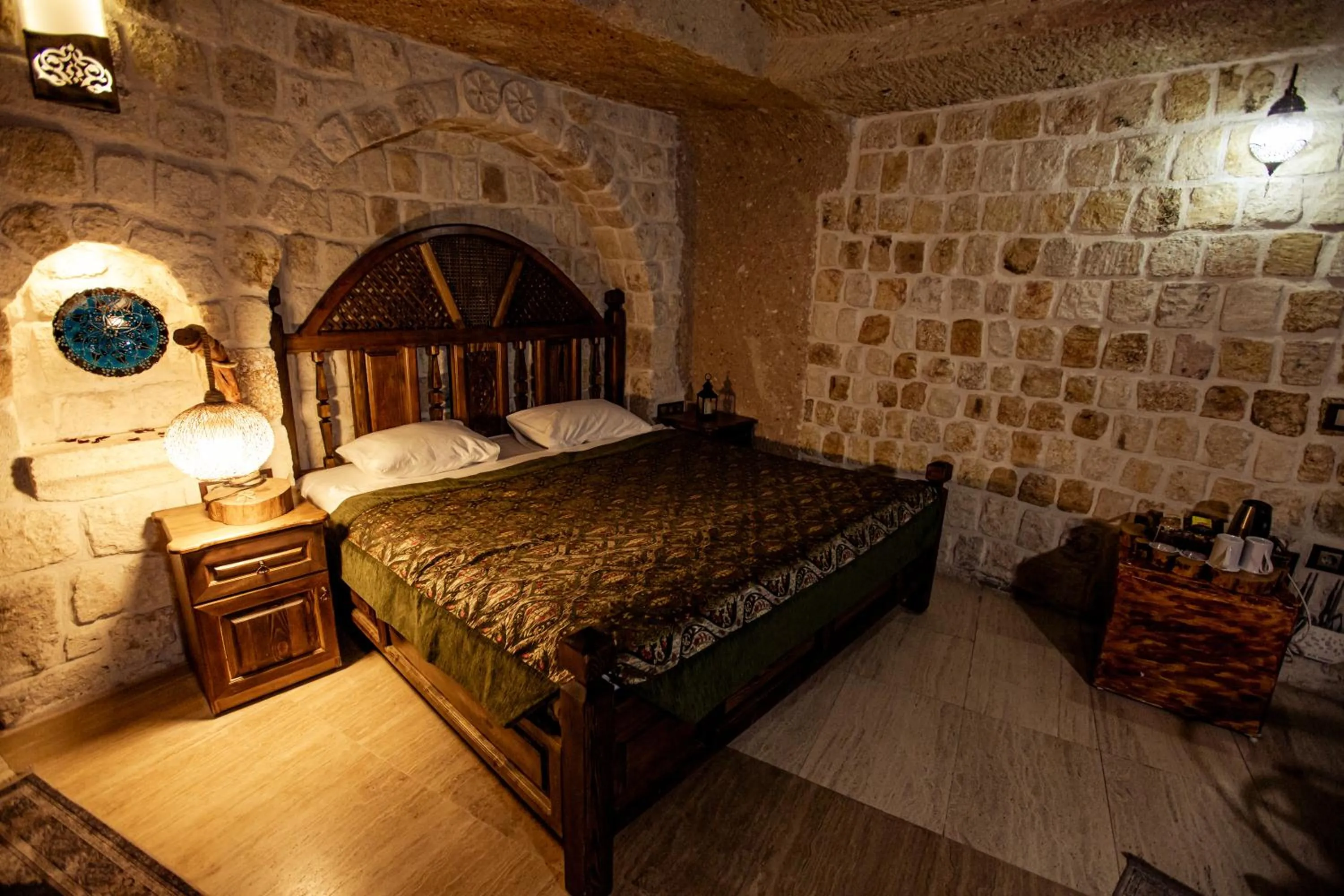 Bed in Oread Cave Suites