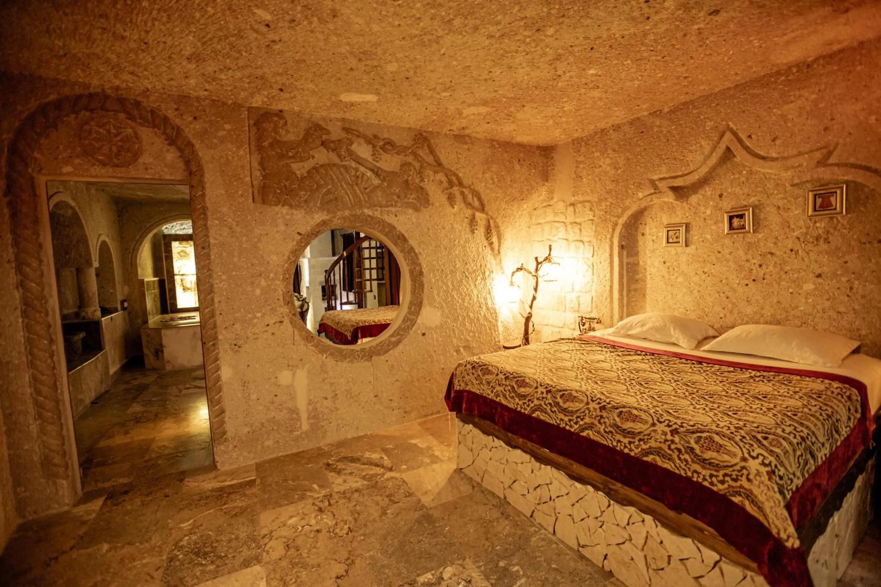 Bed in Oread Cave Suites