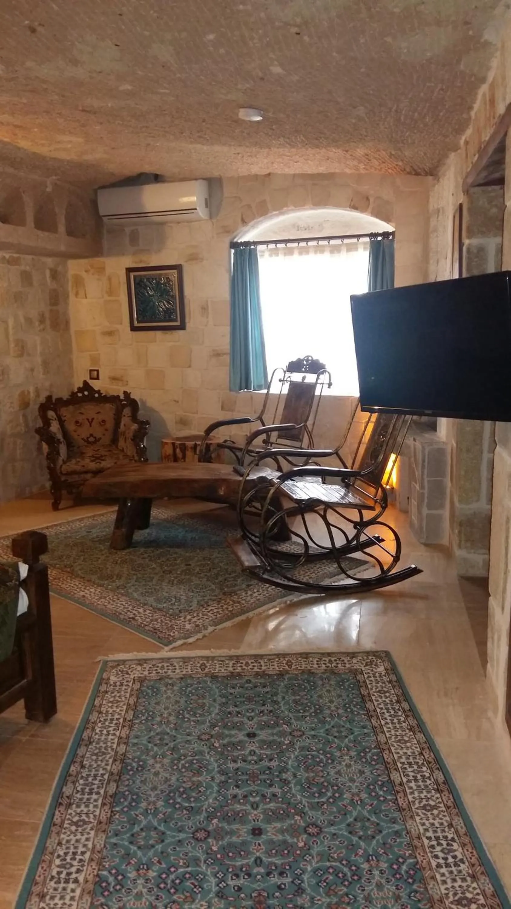Living room in Oread Cave Suites