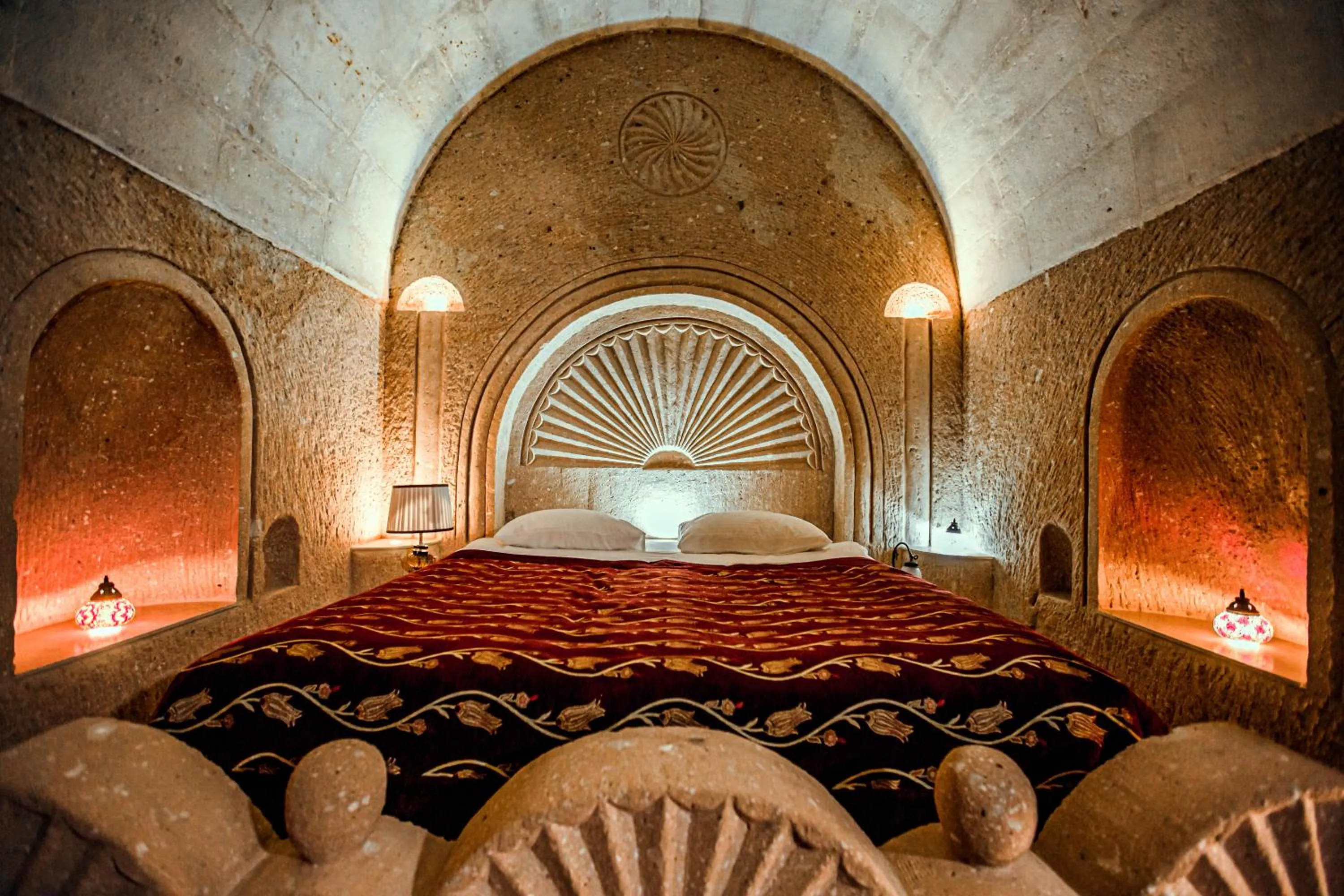 Bed in Oread Cave Suites