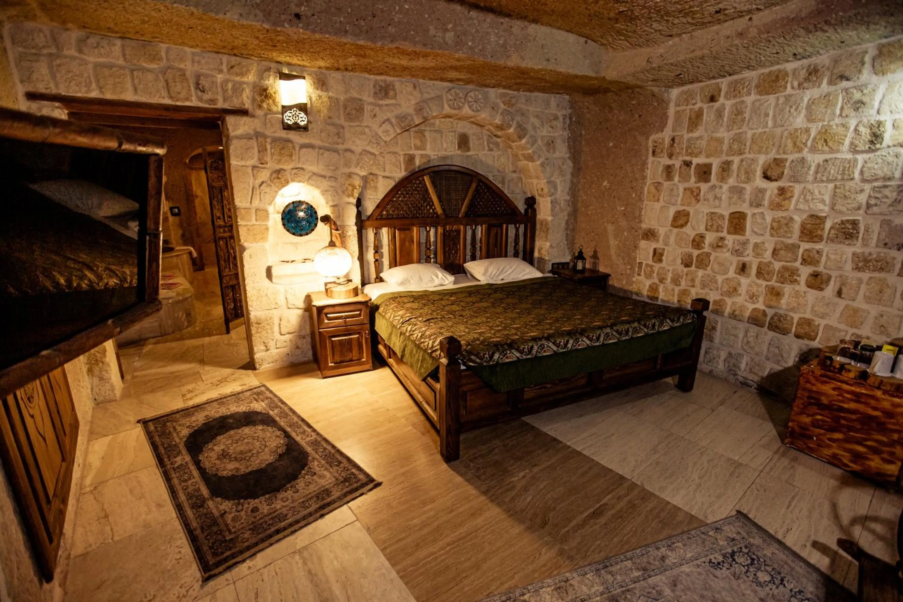 Bed in Oread Cave Suites