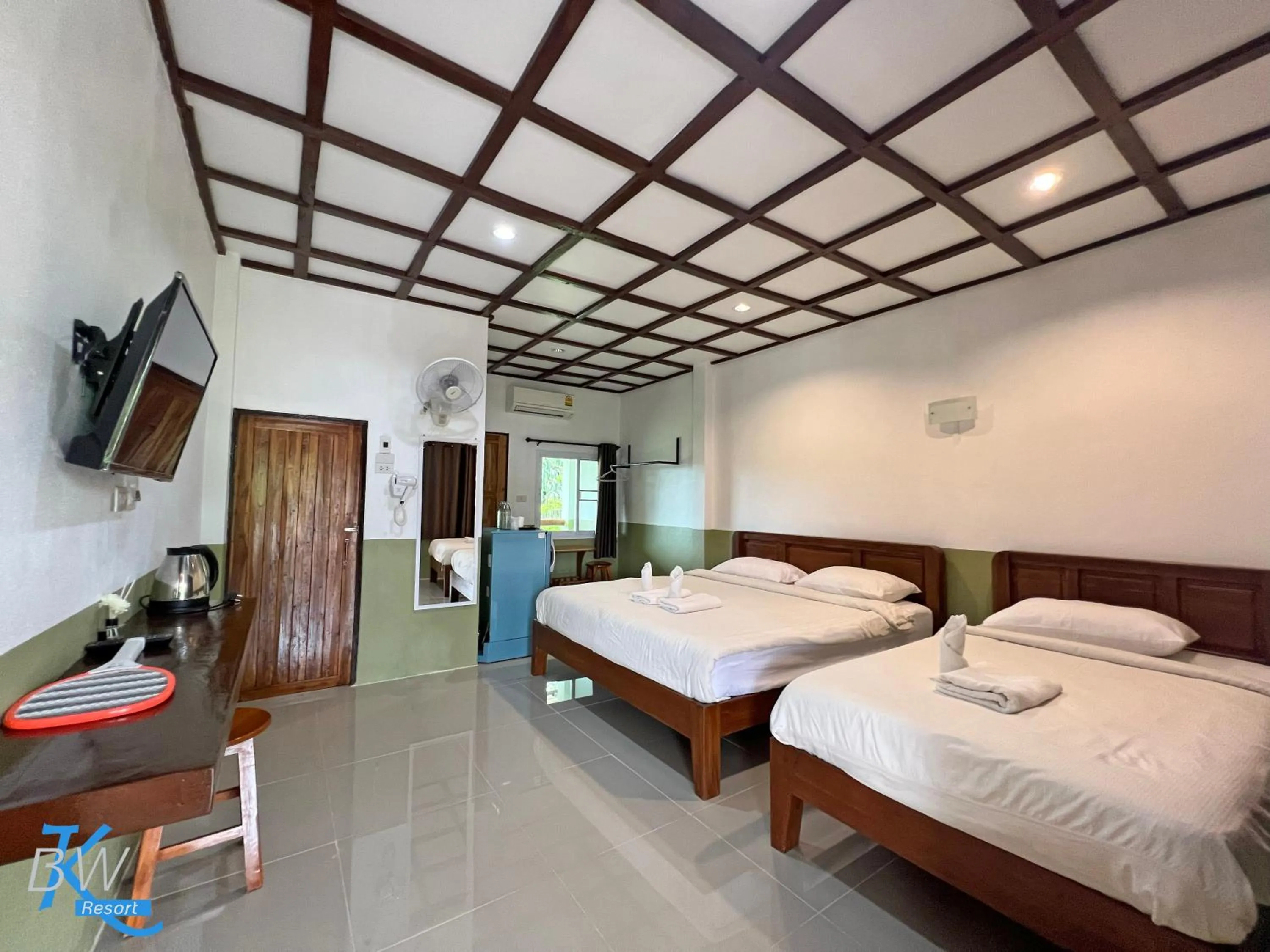 Bed in Baan Khue Wieng Resort