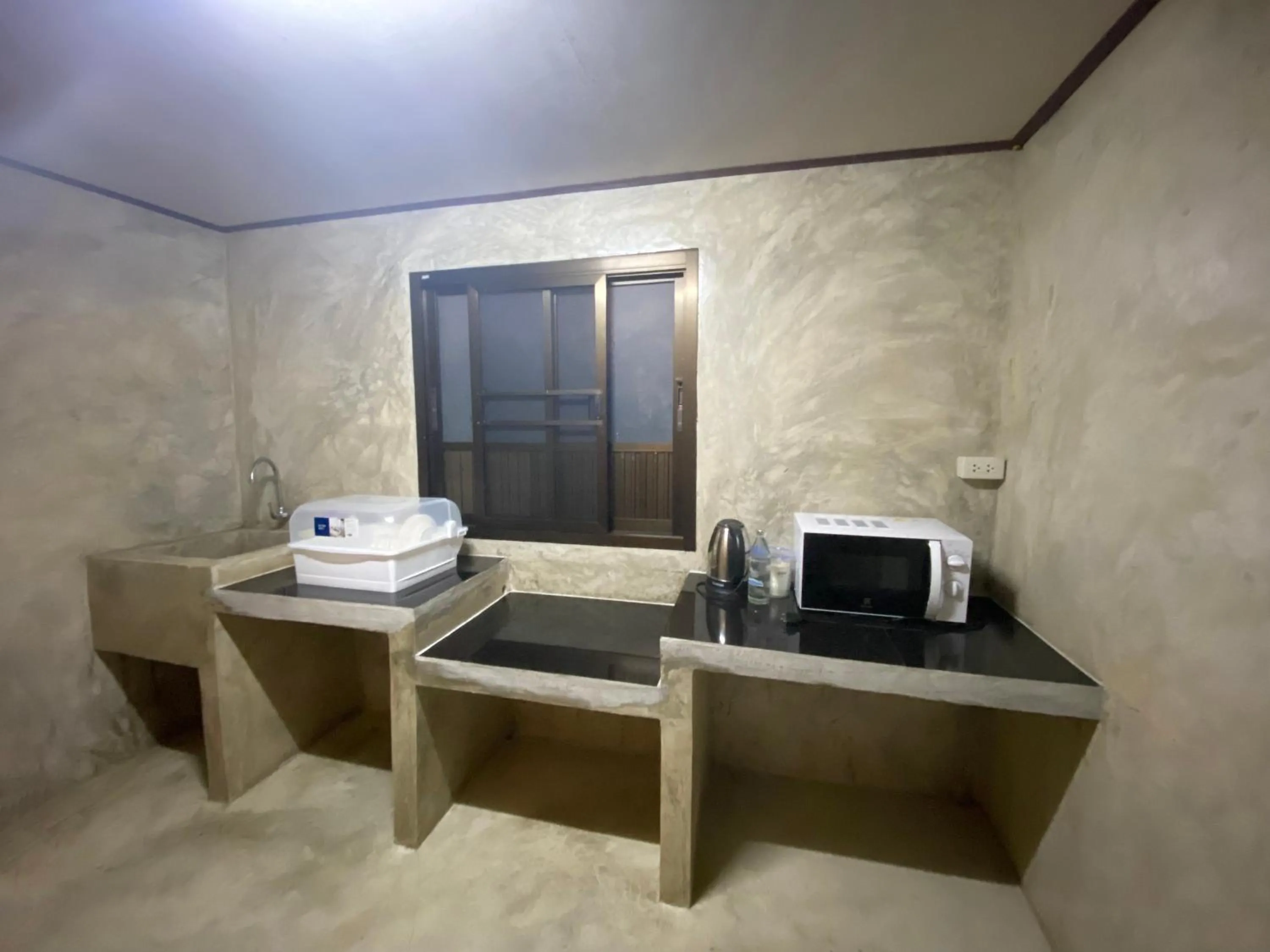 Kitchen or kitchenette in Baan Khue Wieng Resort