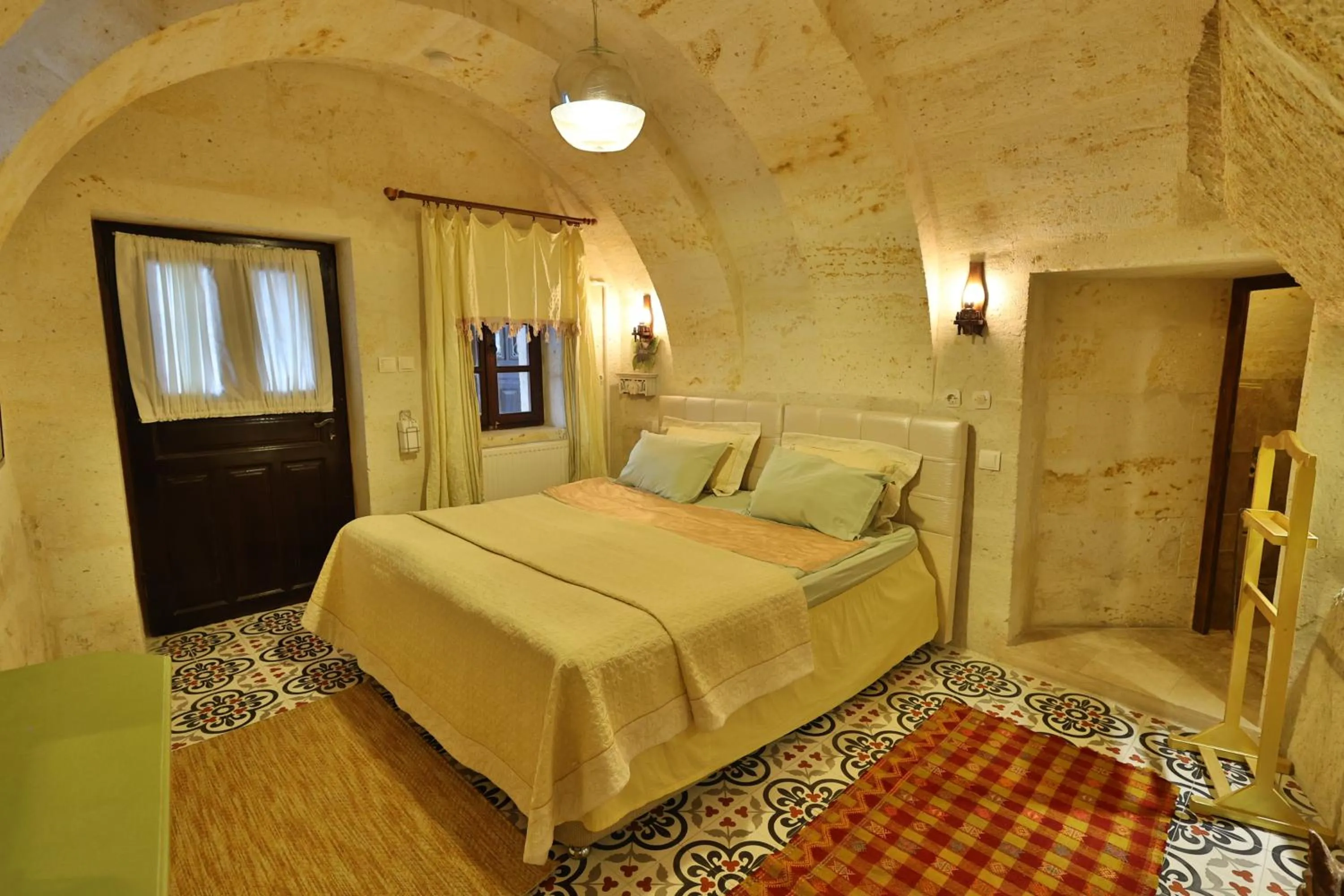 Photo of the whole room, Bed in Demisos Caves Hotel