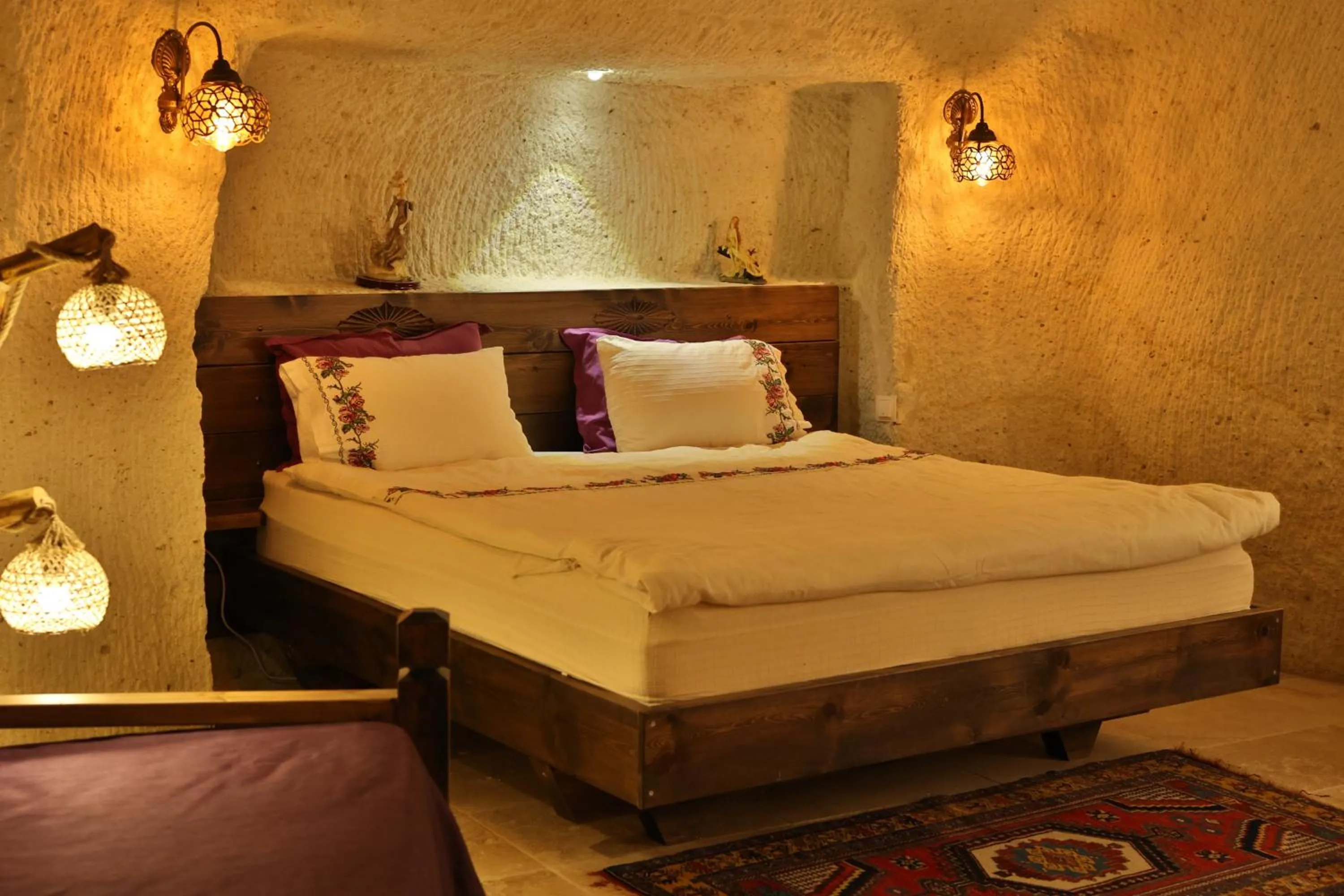 Photo of the whole room, Bed in Demisos Caves Hotel