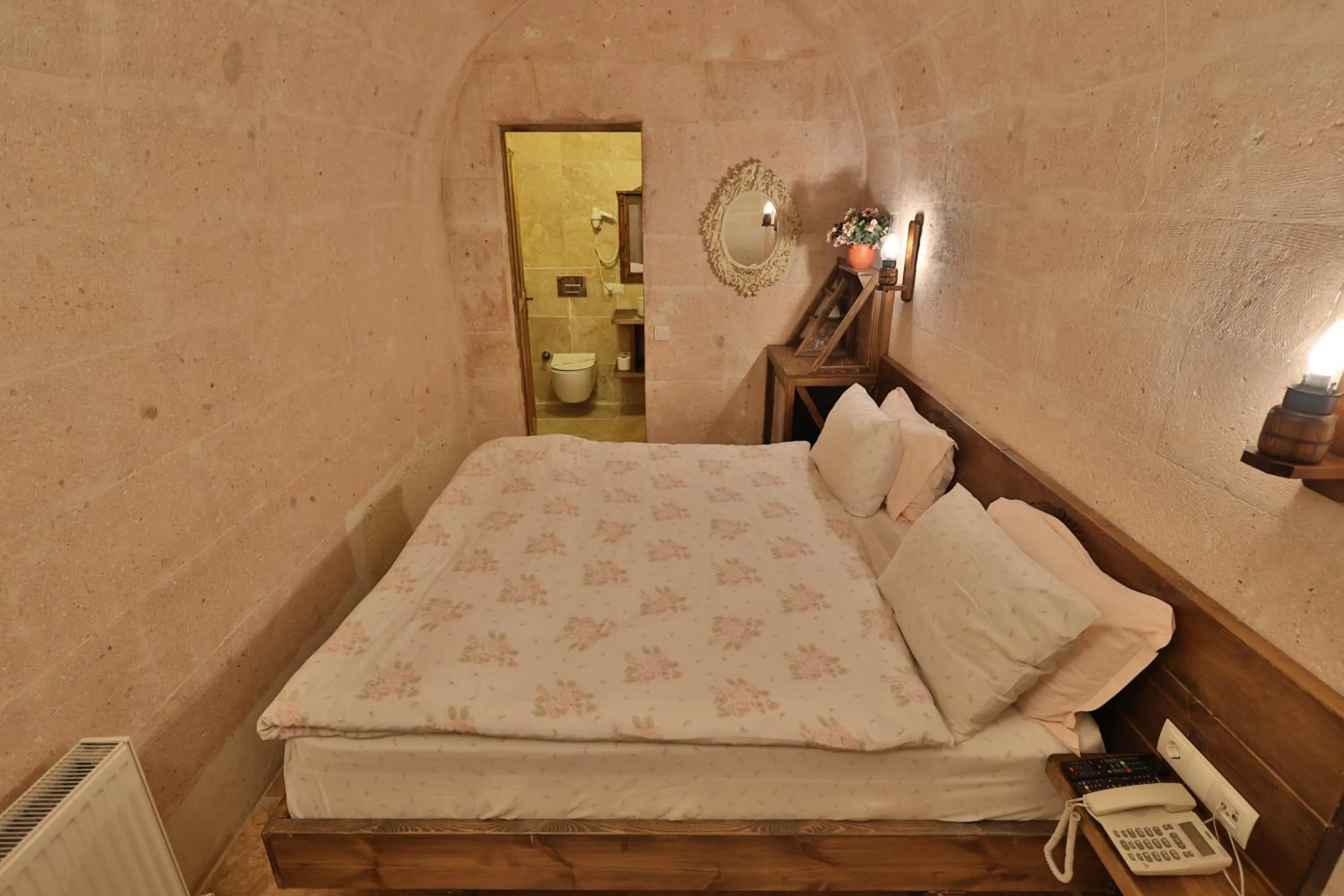 Photo of the whole room, Bed in Demisos Caves Hotel