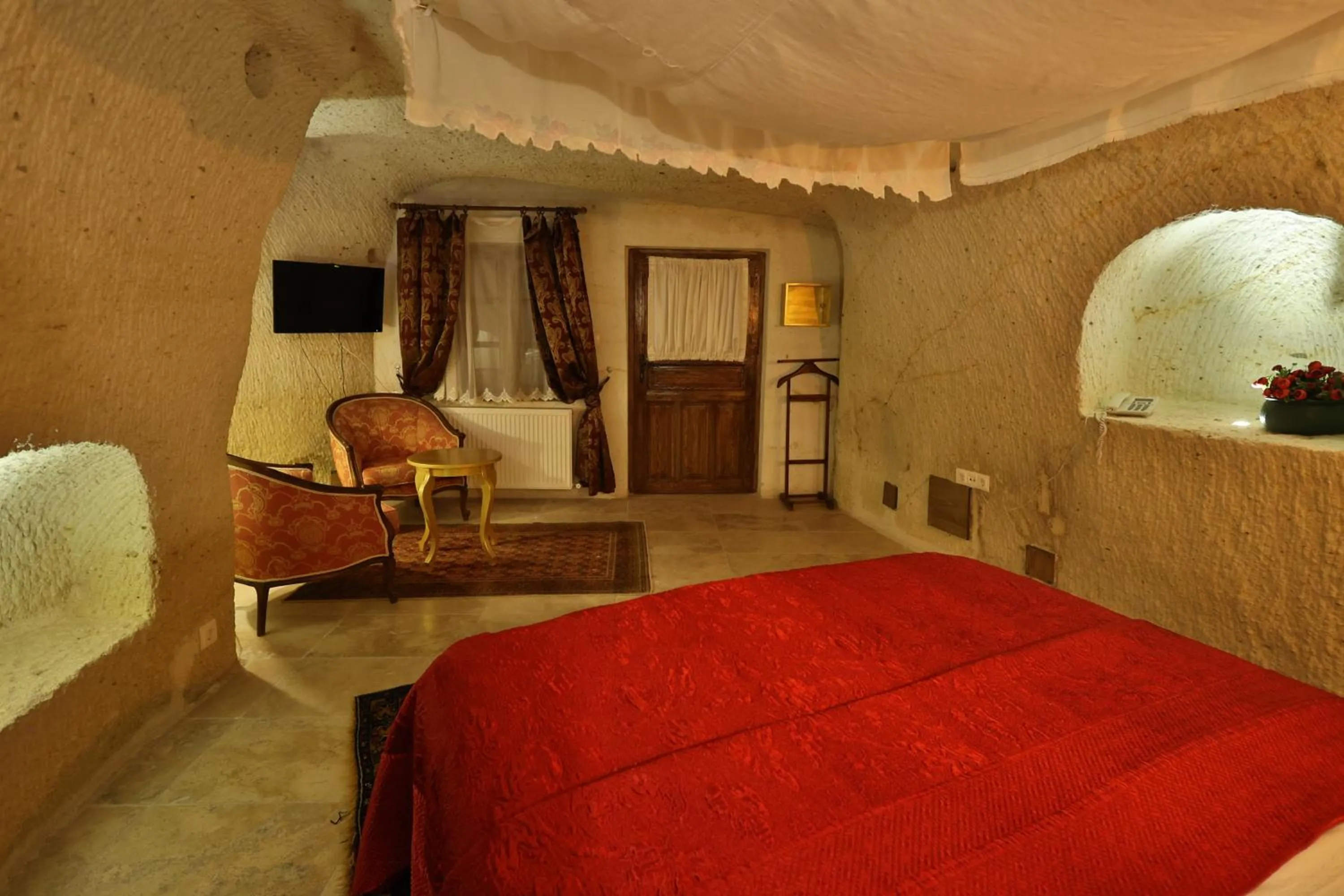 Photo of the whole room, Bed in Demisos Caves Hotel