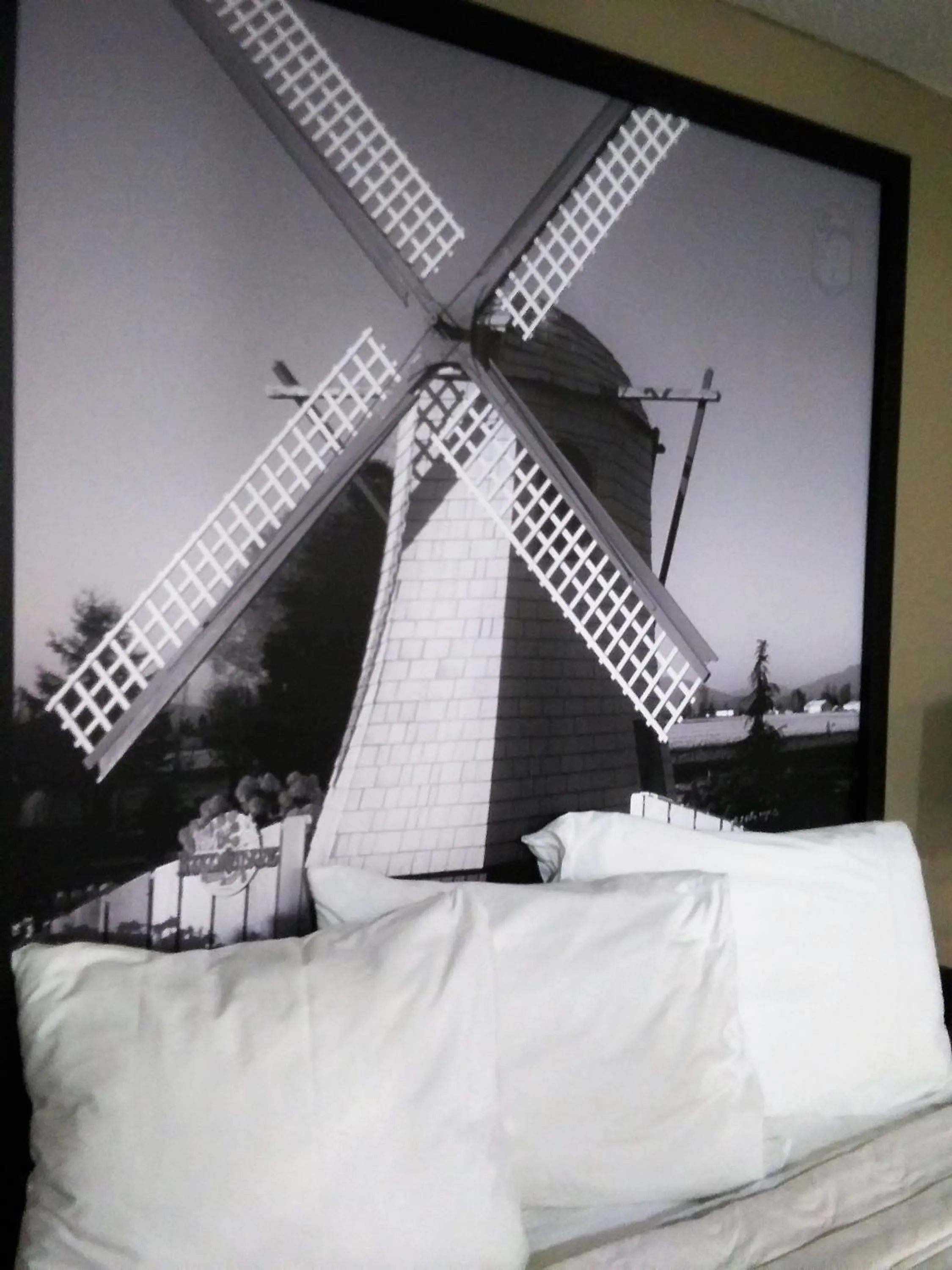 Bed in Sutton Suites Hotel