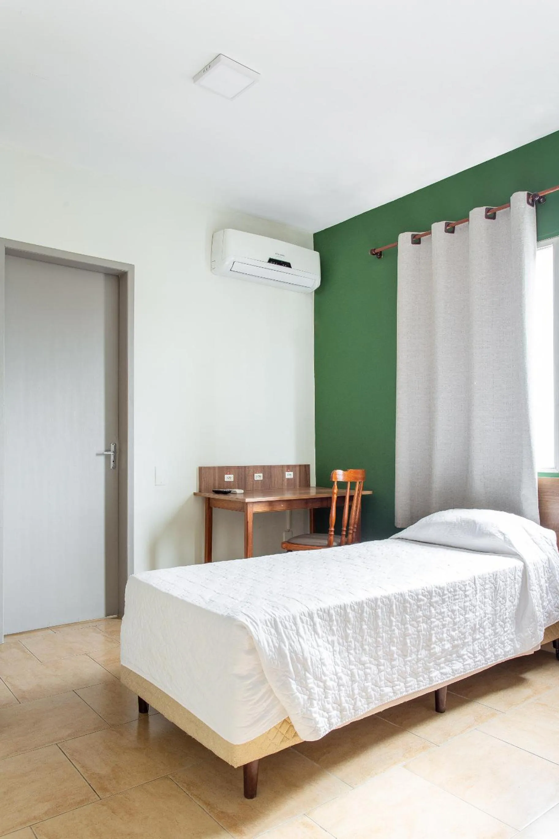 Bed in Hotel Dom Rafael Express