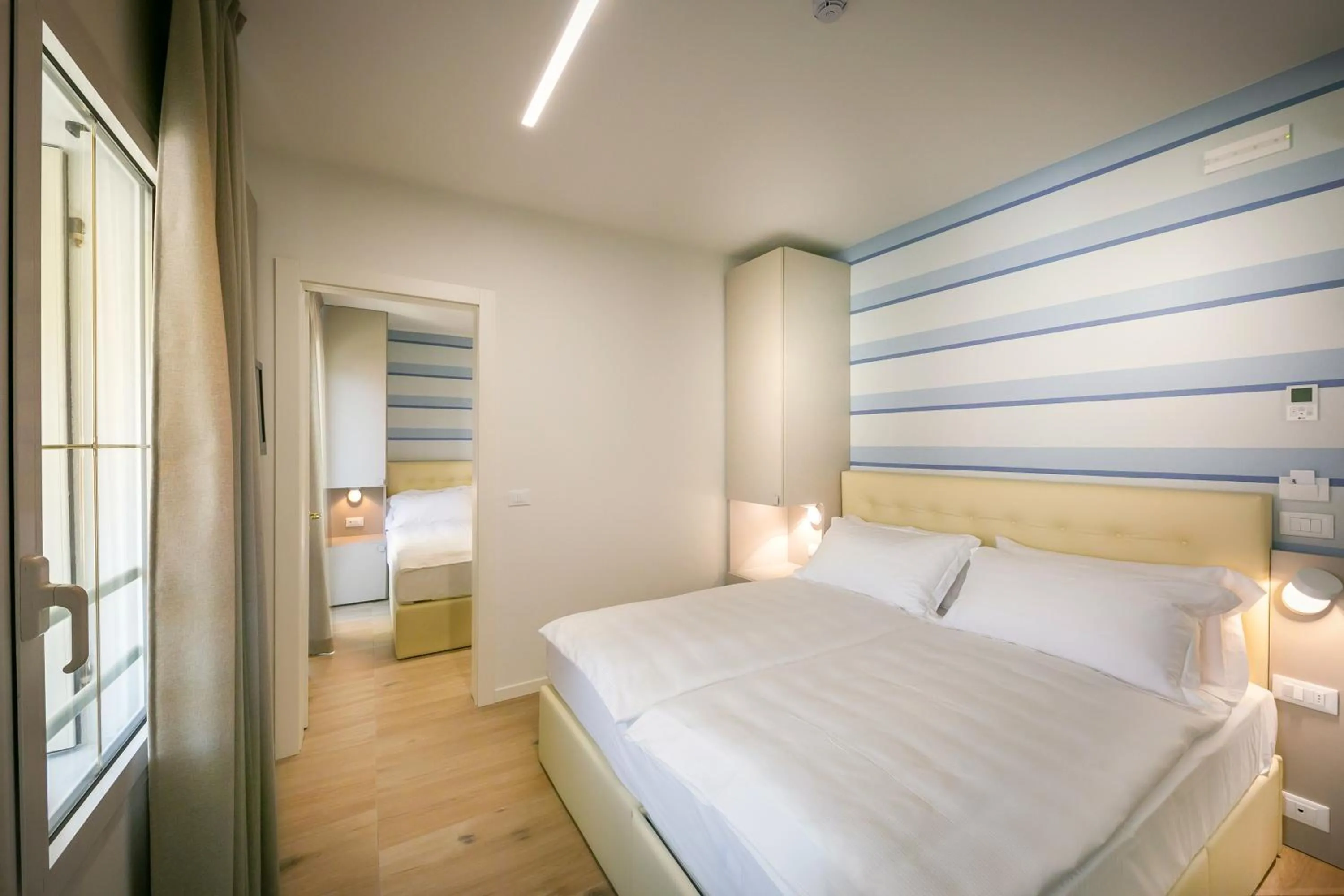 Bedroom in Hotel Le Lampare